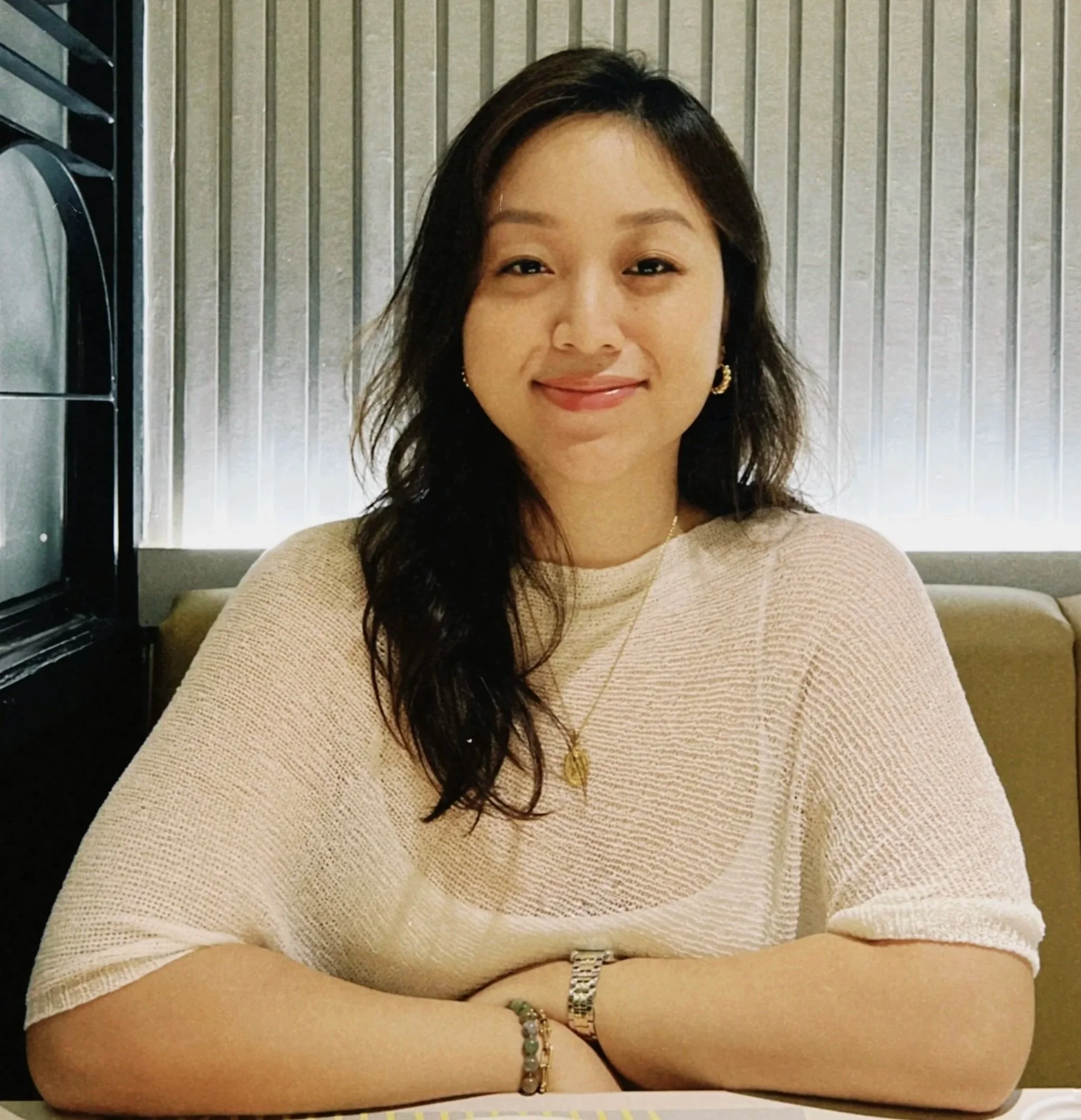 an image of Ashley Quiazon smiling at the camera