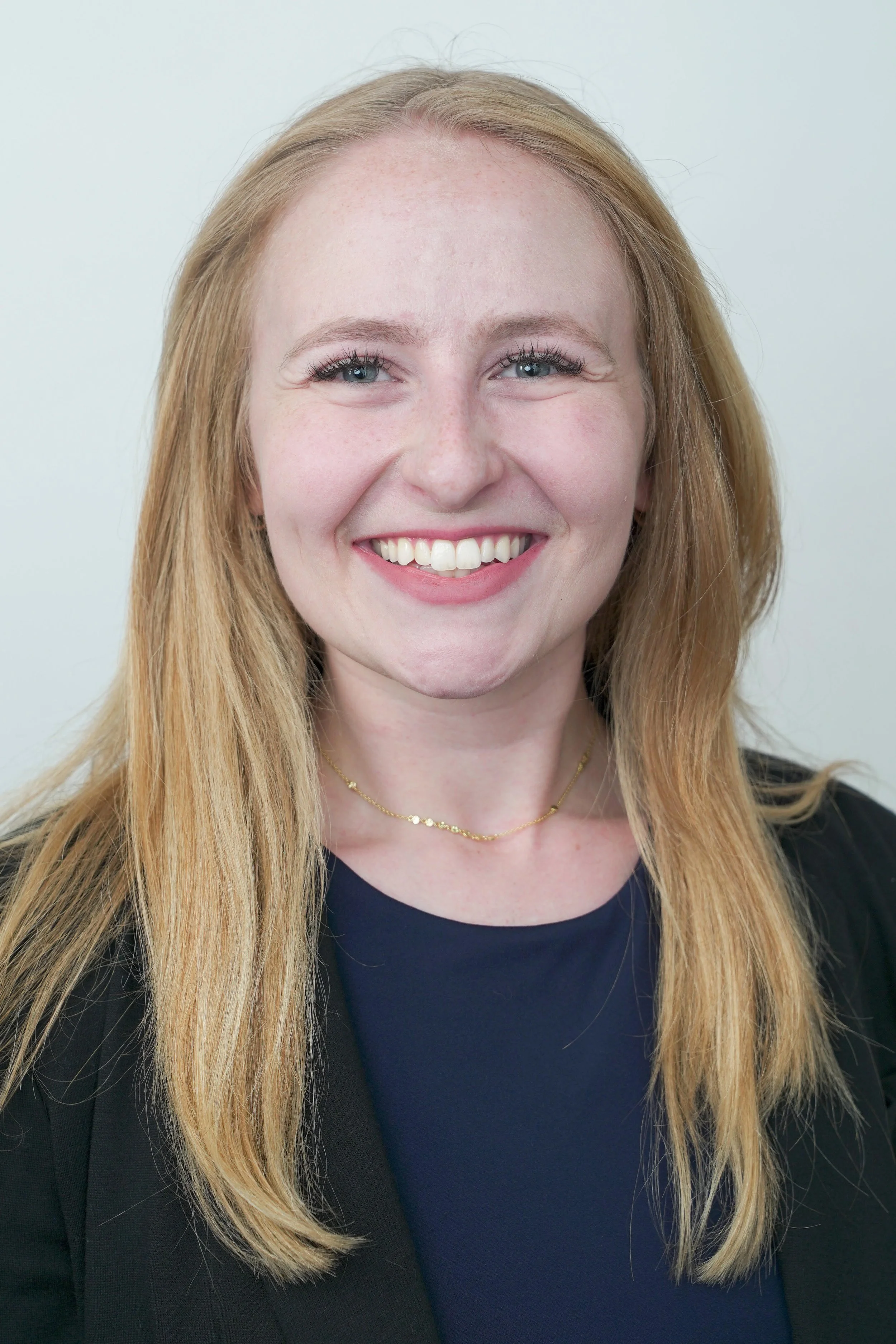 an image of Julia LeVee smiling at the camera