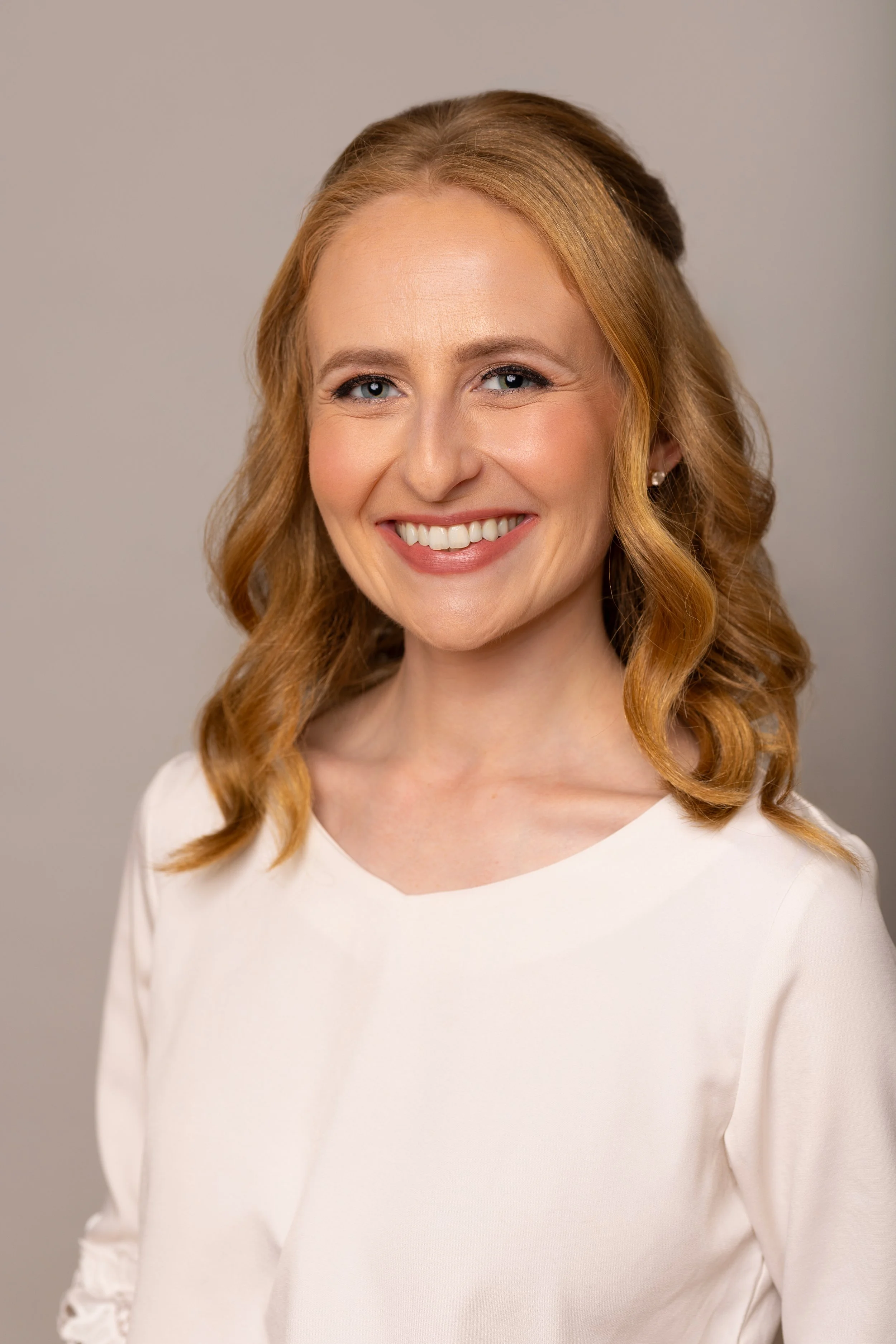 an image of Julia LeVee smiling at the camera