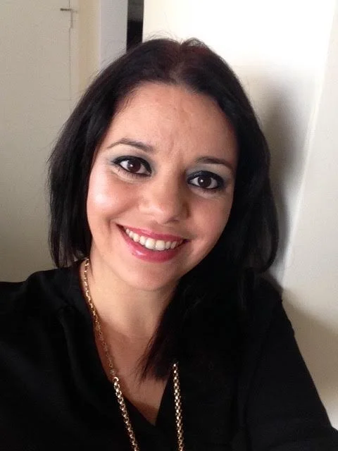 an image of Nahid Niestzche smiling at the camera