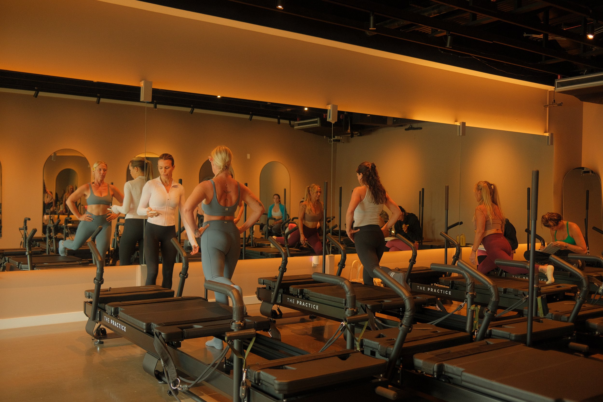 Minimalist Pilates studio design featuring premium XFormer equipment.