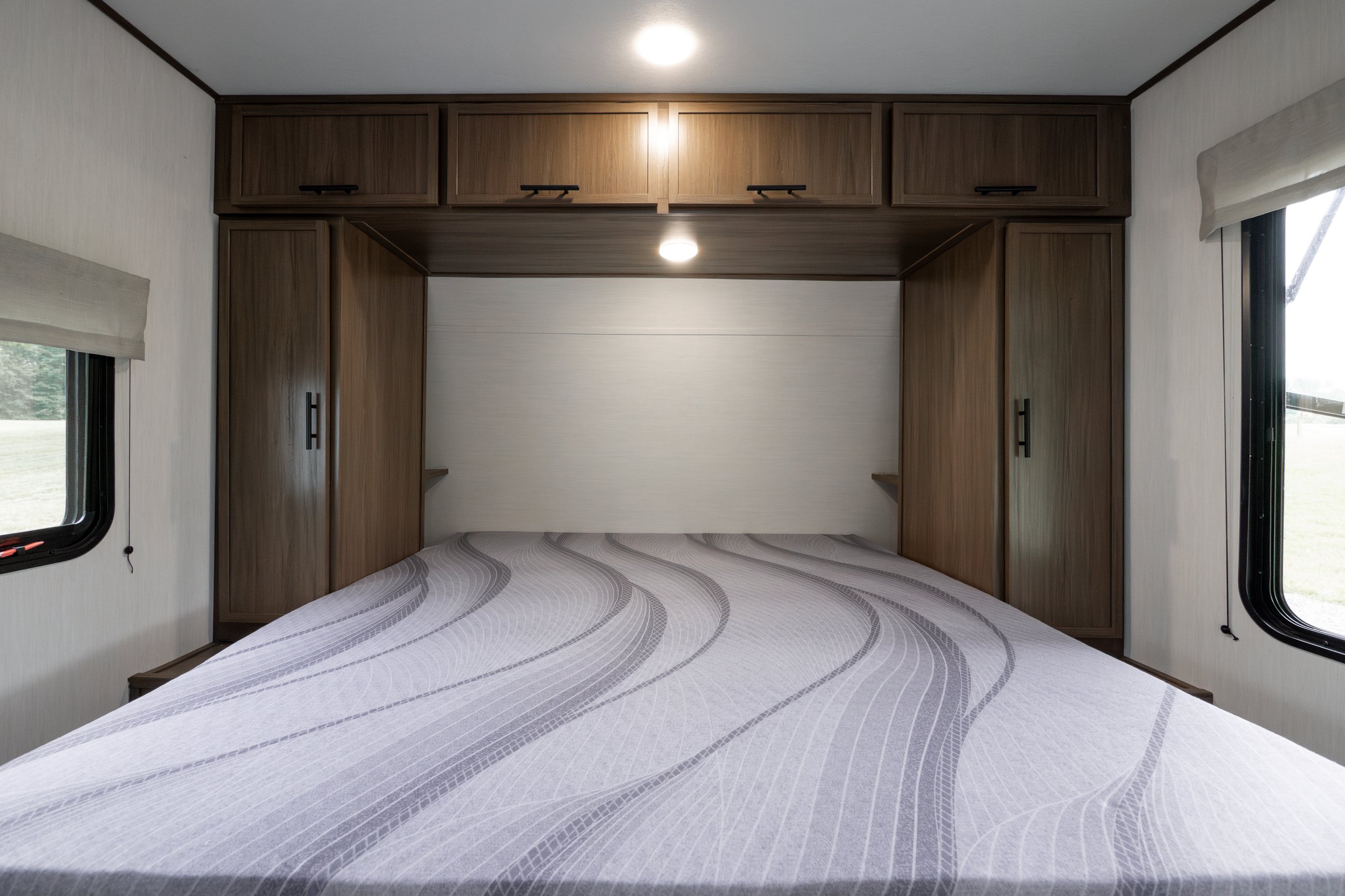 14. Camp king bed and wadrobe storage.jpg