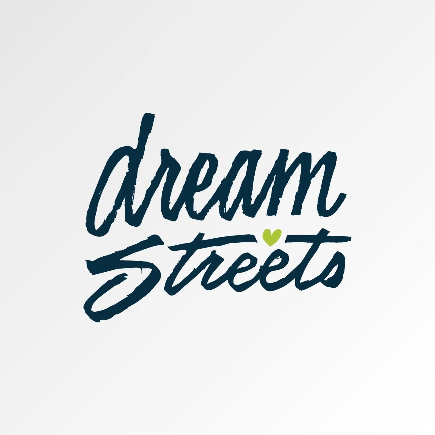 Stylized text that says 'dream street' with a small green heart between the words.