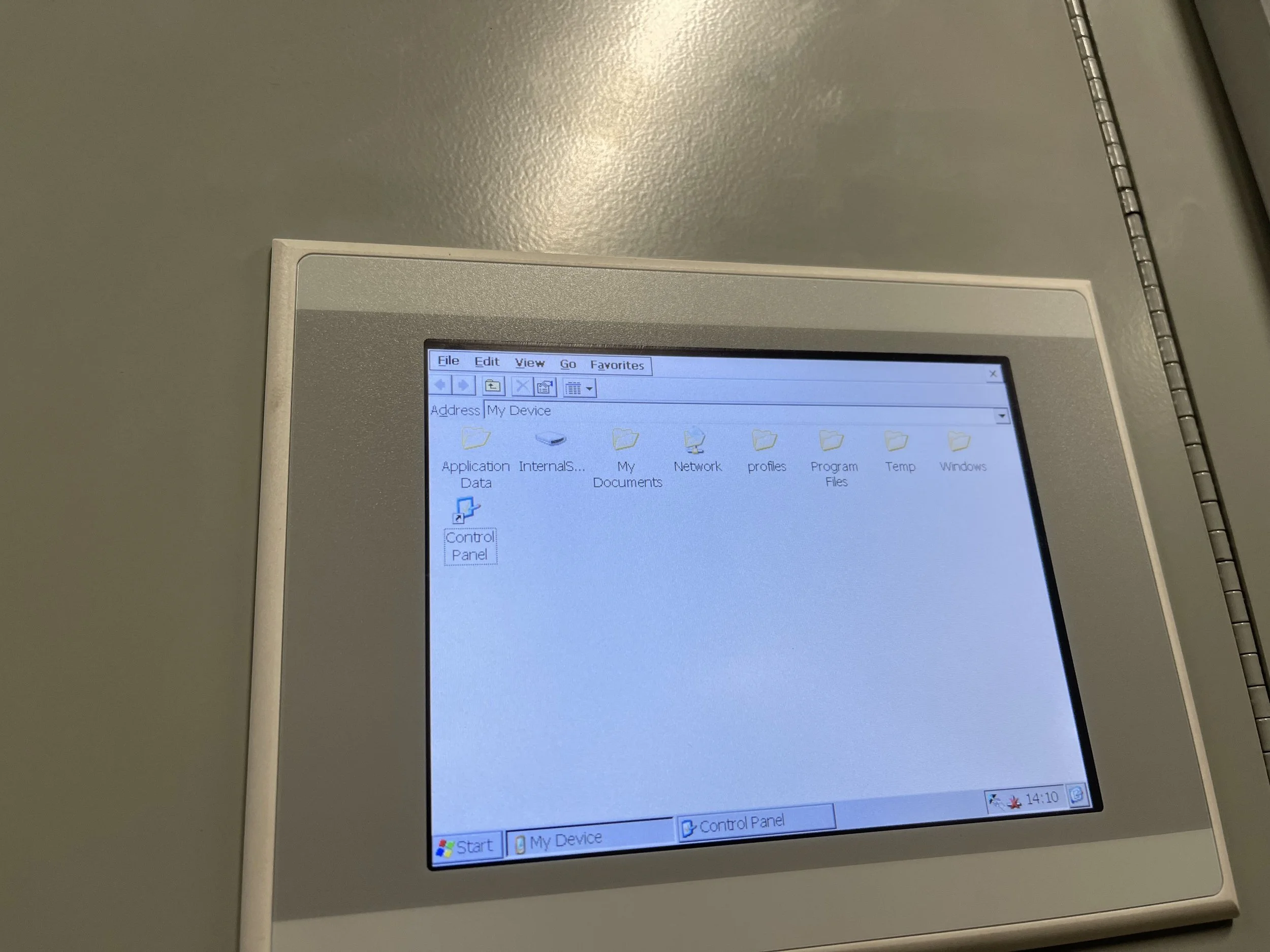 A computer monitor displaying a Windows operating system desktop with folders such as Application Data, InternalS..., My Documents, Network, profiles, Program Files, Temp, Windows, and a Control Panel icon.