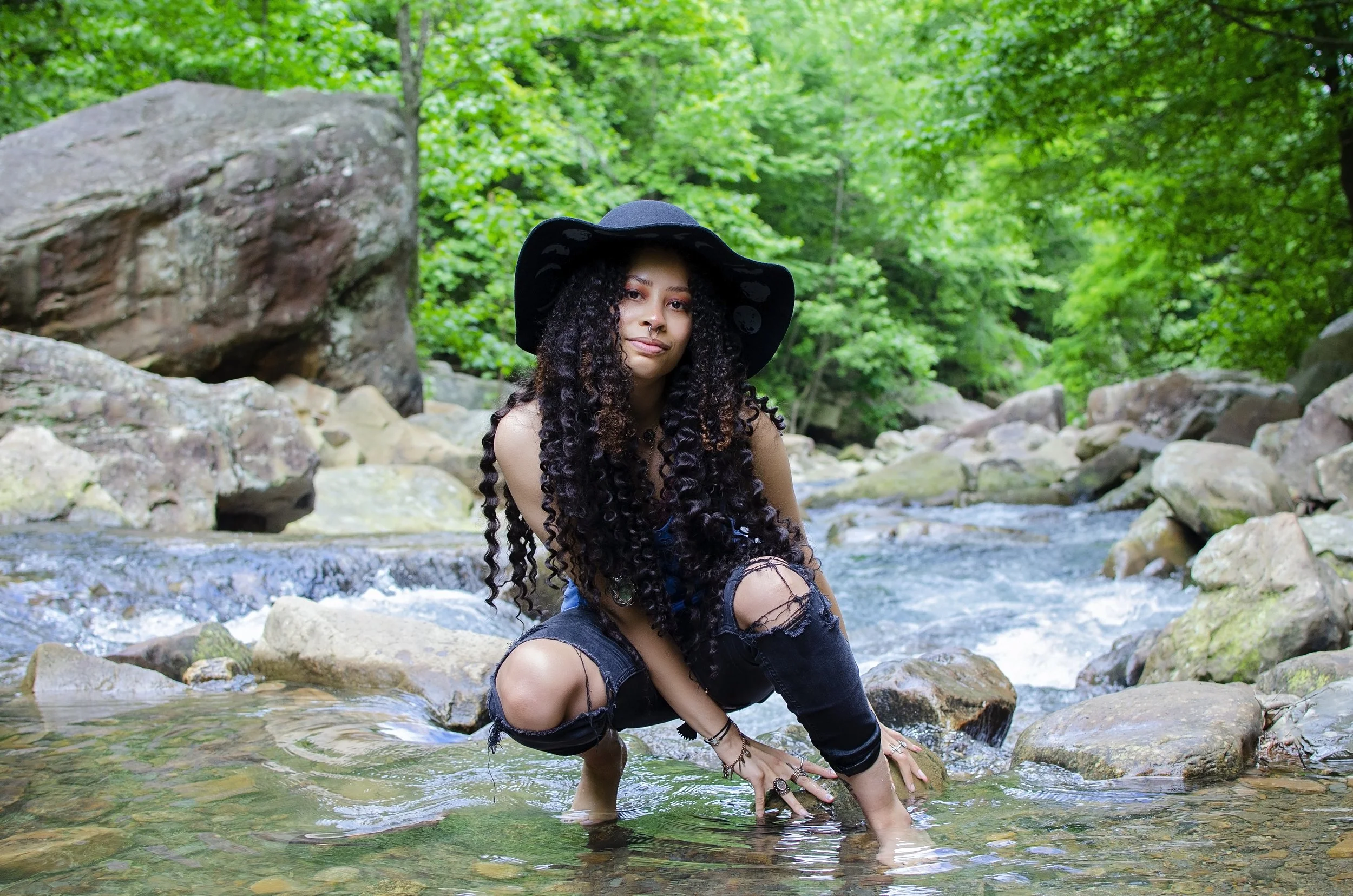 Tori- crouched in the river.JPG