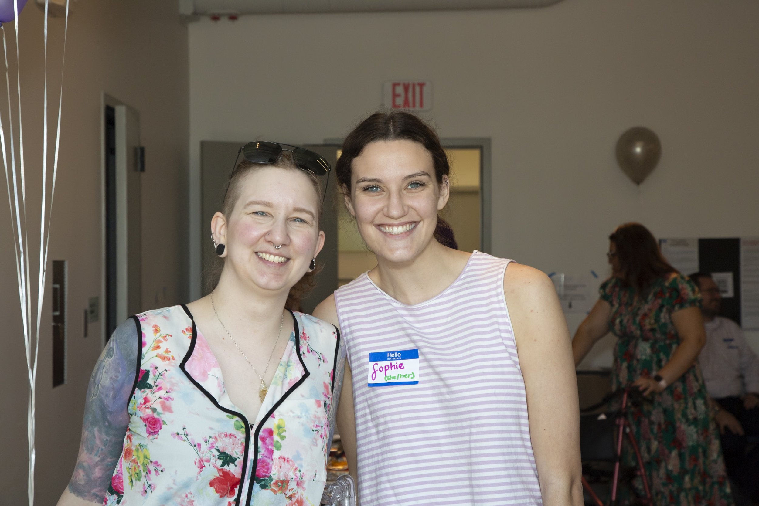 two DDP Members smiling
