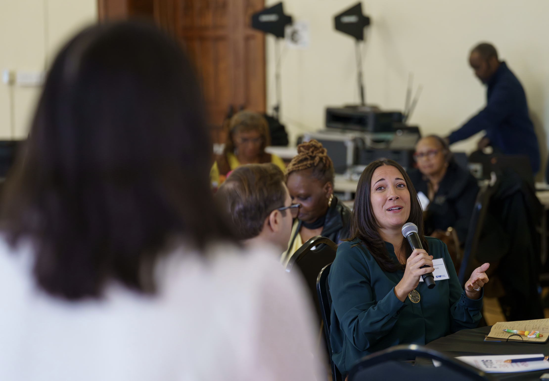 Participant asking a question during DAC workshop