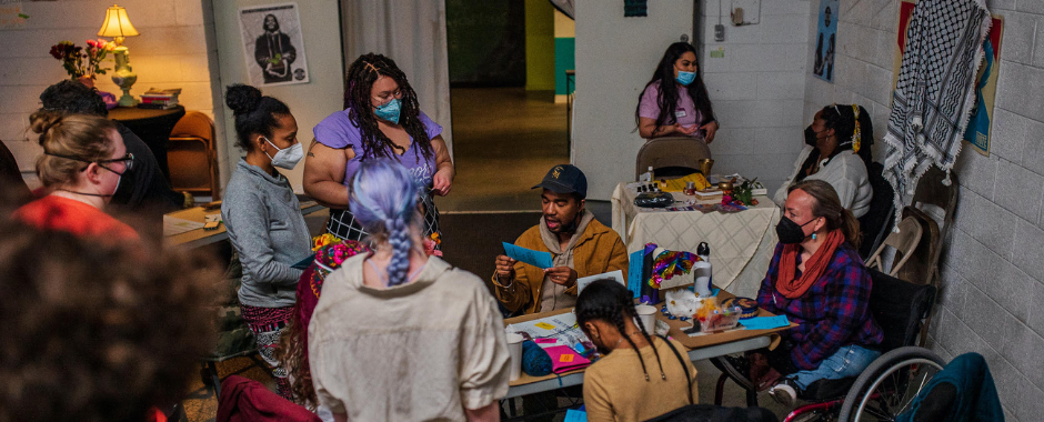 Activists gathered around a table