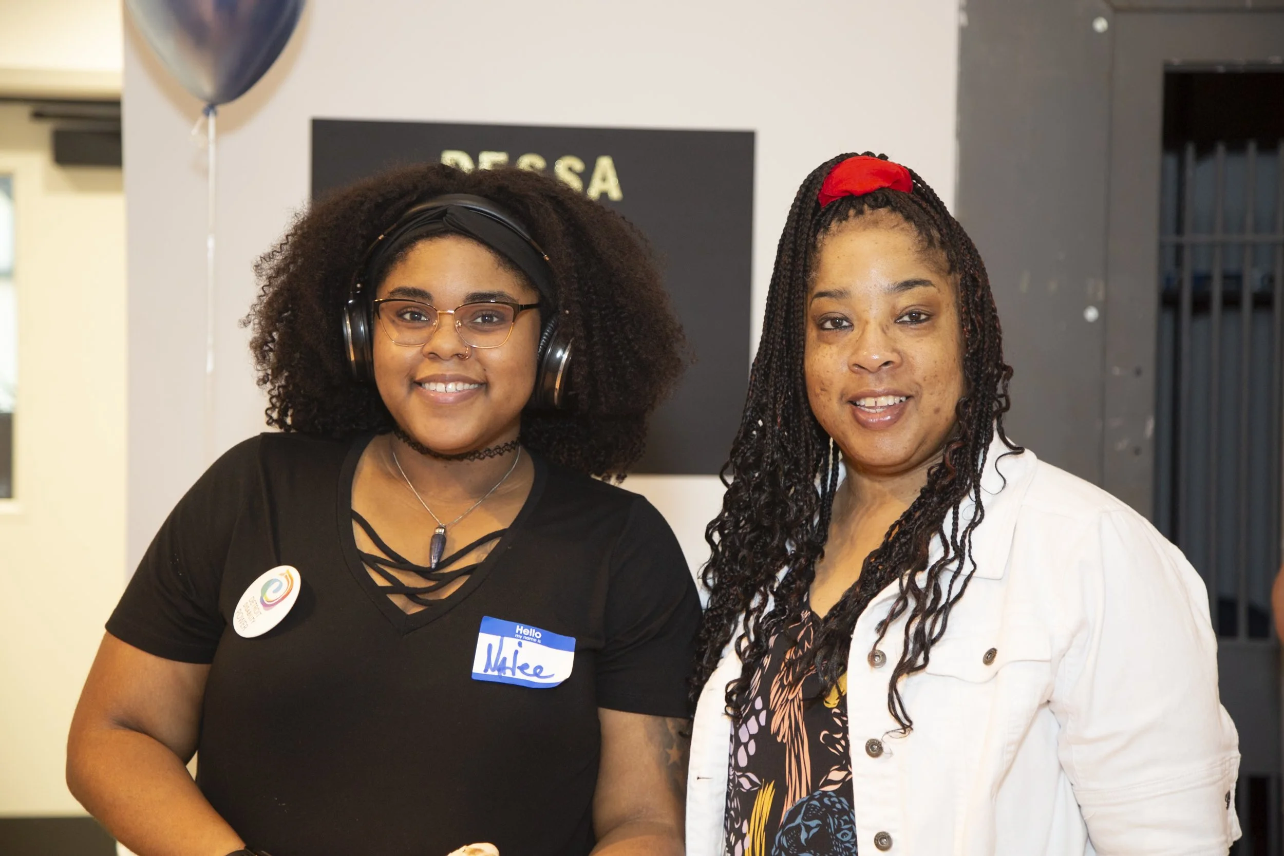 two DDP Members smiling