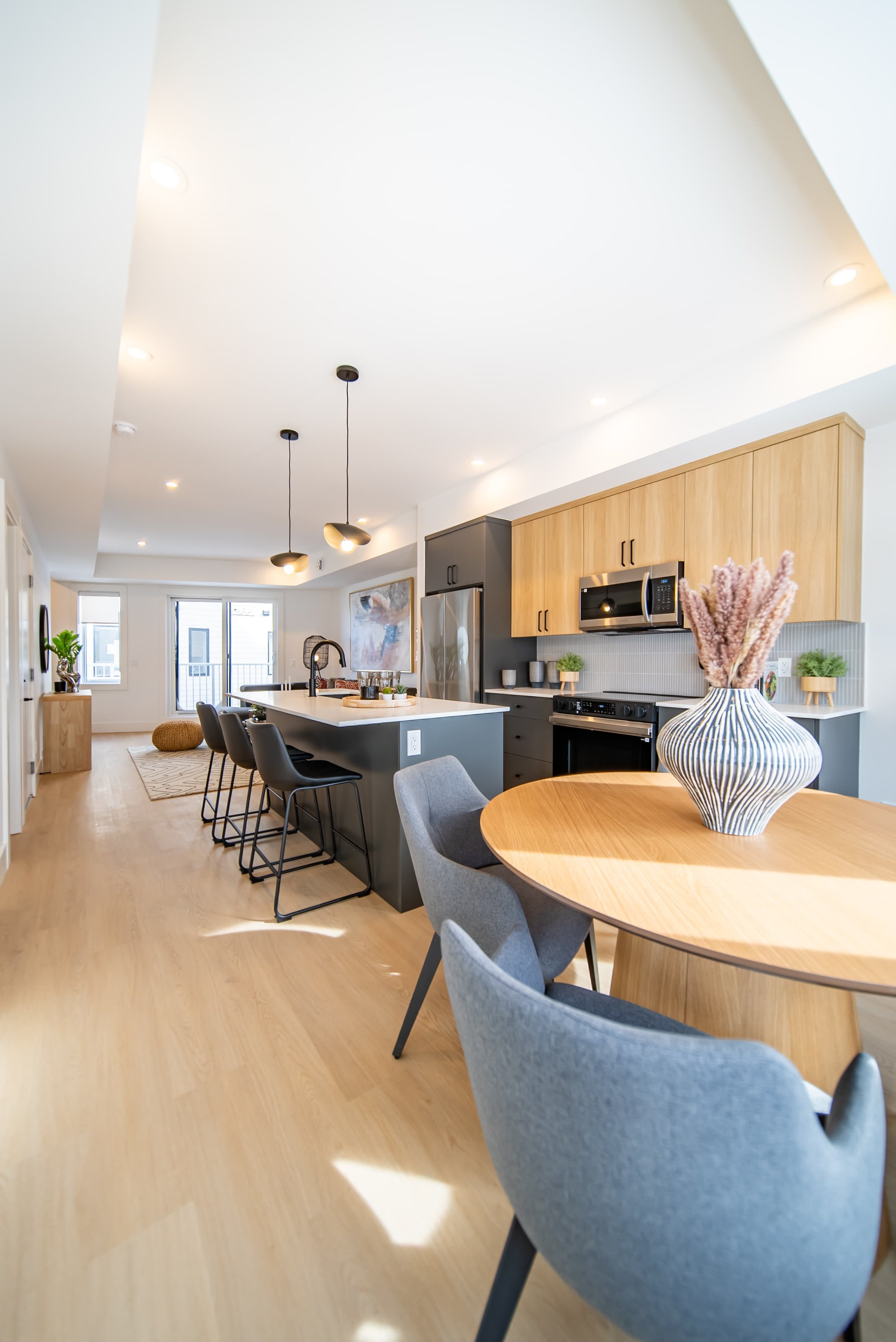 Living room and kitchen photo of a new rental townhome