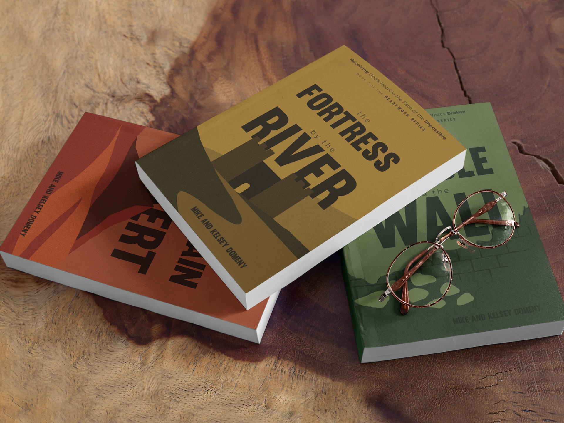 mockup-of-three-books-and-reading-glasses-on-a-wooden-table-a17420 (1).png