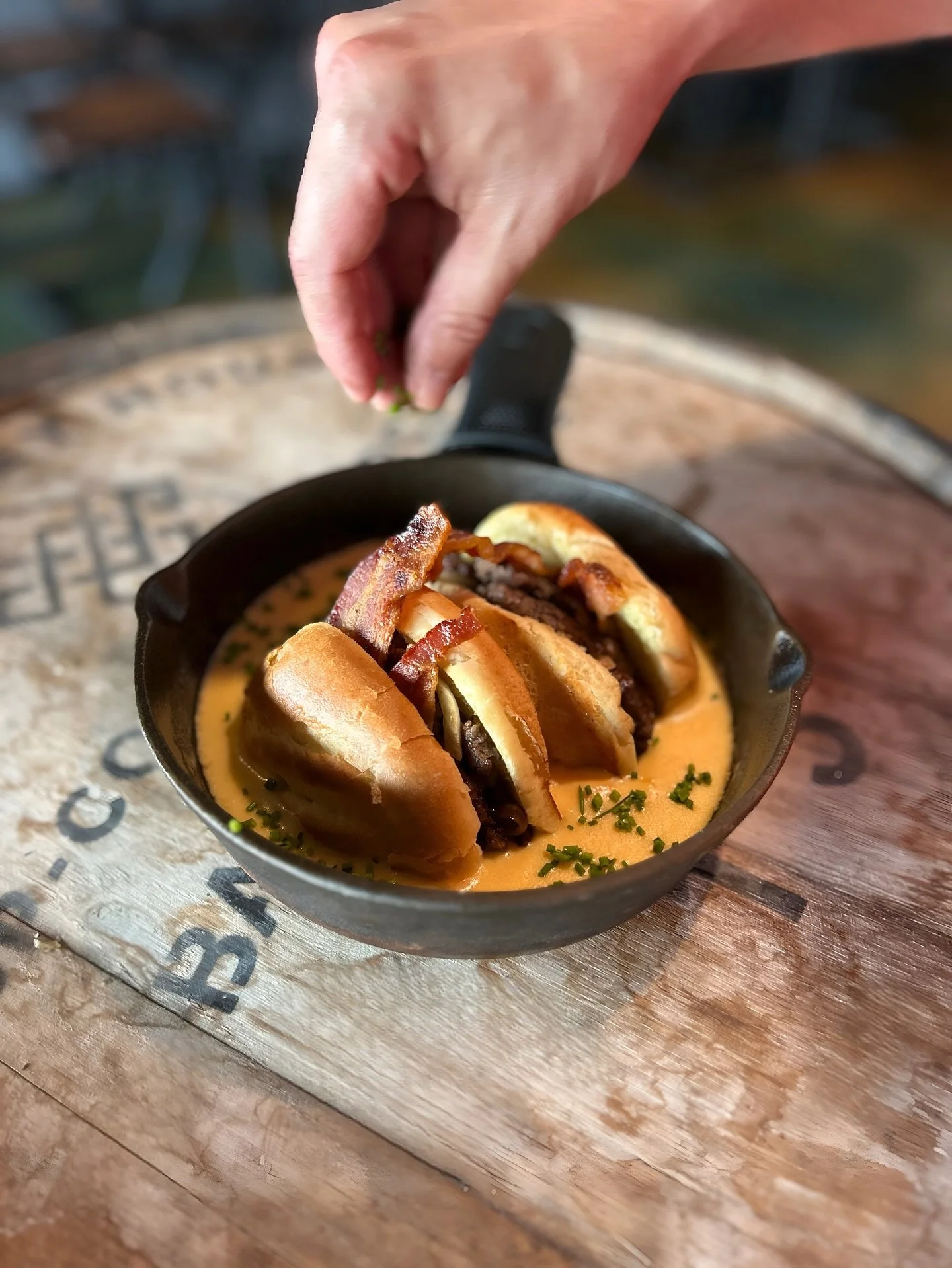 Need more cheese in your life? So do we, and we have the answer. Introducing our new feature burger: The Big Dipper. Two crispy smash patties stacked with grilled onions and crispy bacon, all served bubbling in a skillet filled with our signature hou