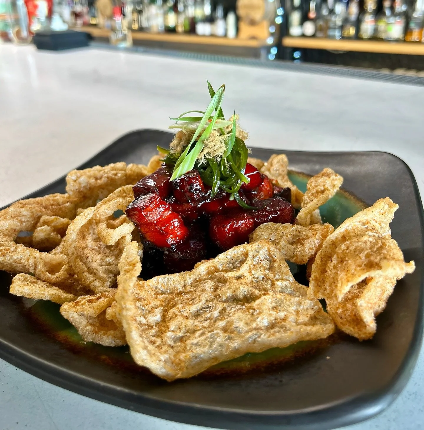 Featured this evening: Honey Chipotle Glazed Pork Belly Burnt Ends. Tender, smoked Cheshire pork belly, caramelized in a bold honey-chipotle glaze. Finished with a kick of candied jalape&ntilde;os and served alongside crispy pork cracklins dusted wit
