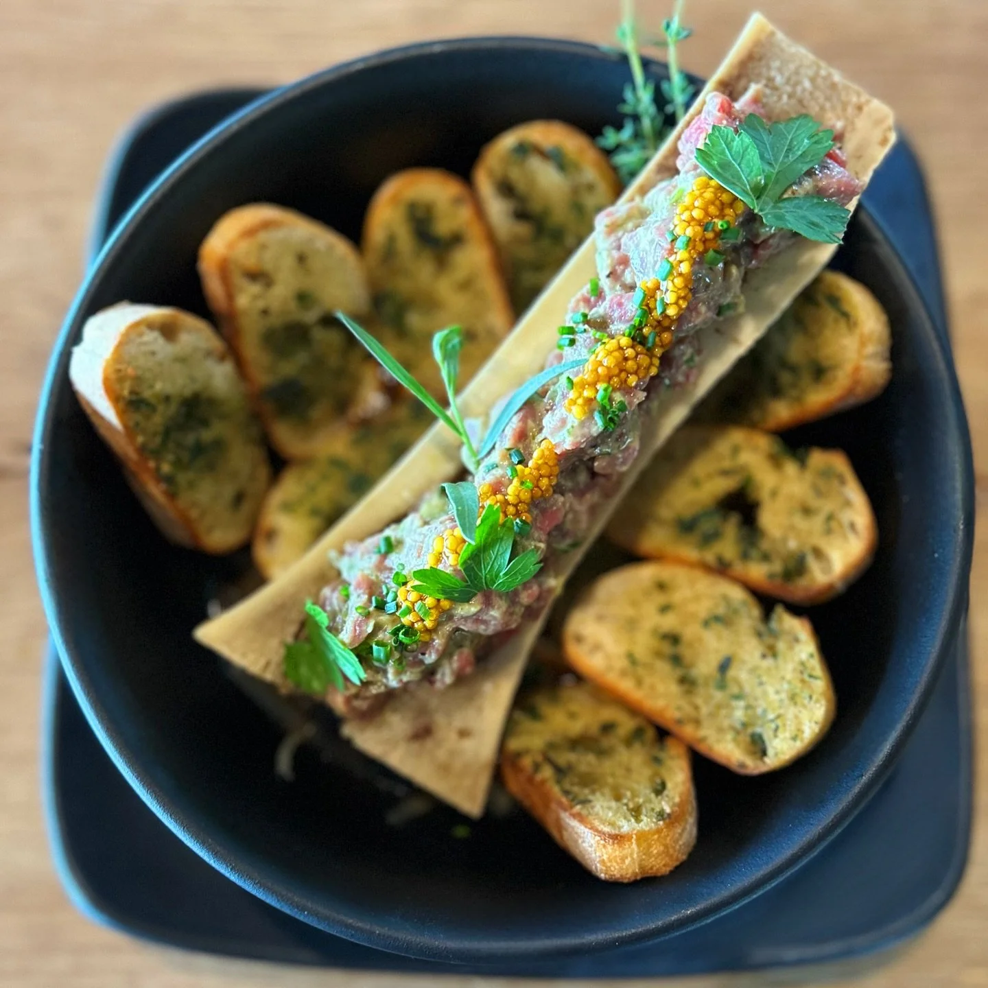Don&rsquo;t miss today&rsquo;s feature at the Oyster Bar: Beef Tartare

Finely diced beef tenderloin delicately tossed in a herb Dijon and Bukketrabe white wine sauce, finished with tangy pickled mustard seeds. Served over a rich French onion broth, 