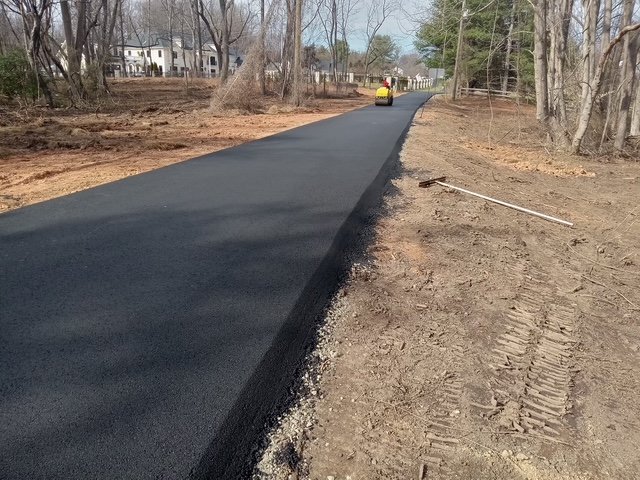 Freshly paved black asphalt road