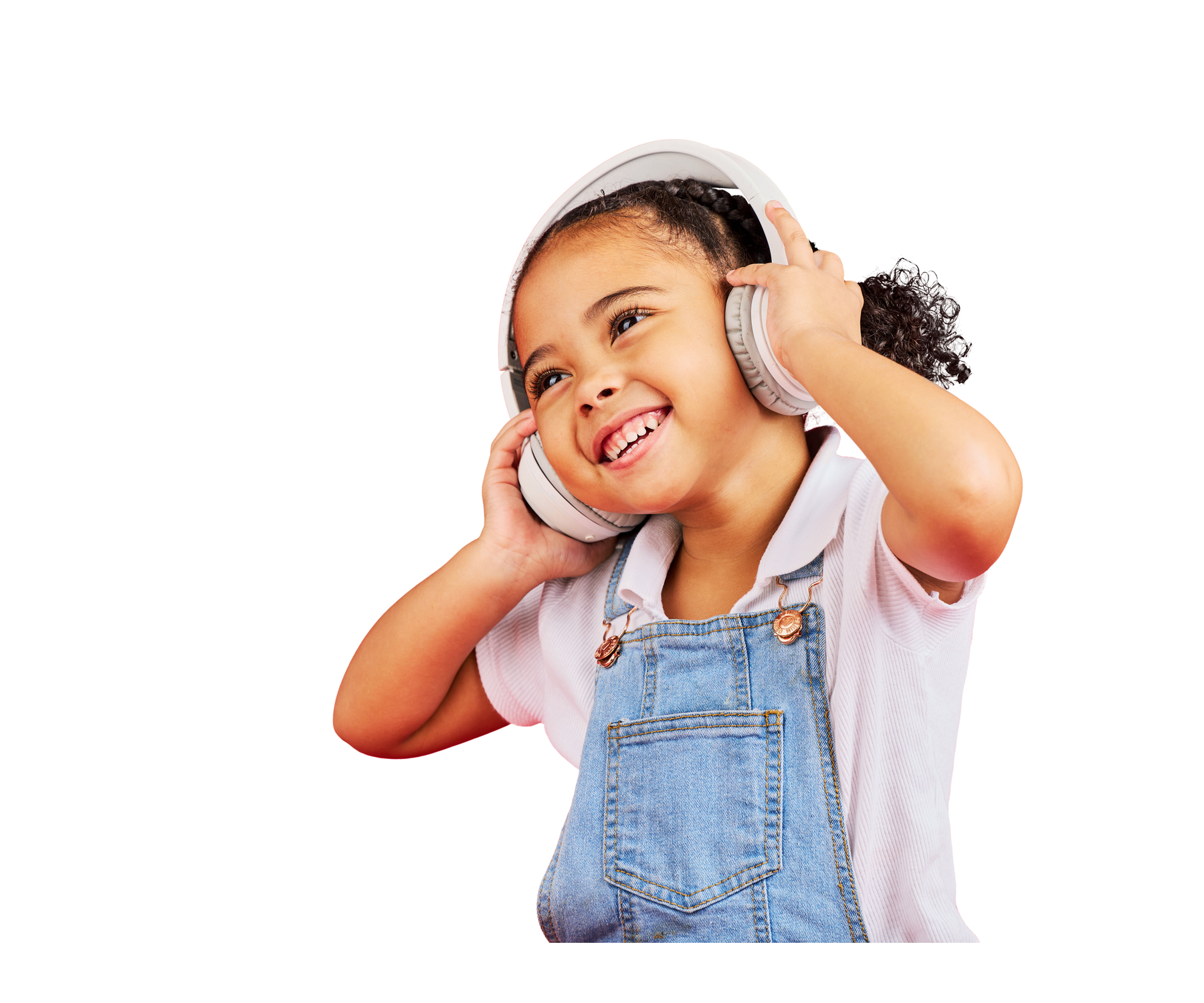 Child listening with headphones during pediatric speech therapy in Houston, TX