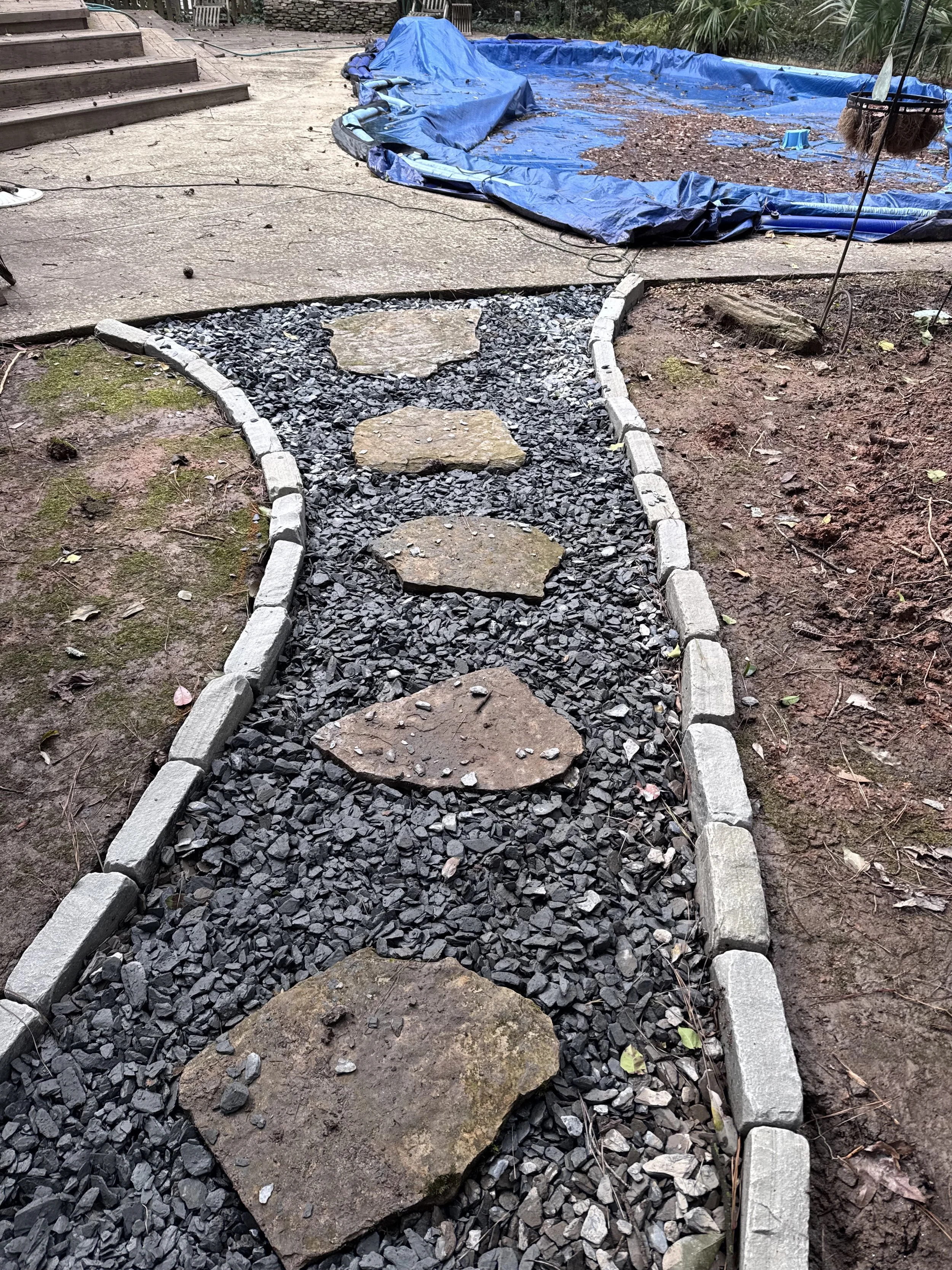 Slate chip pathway flared out