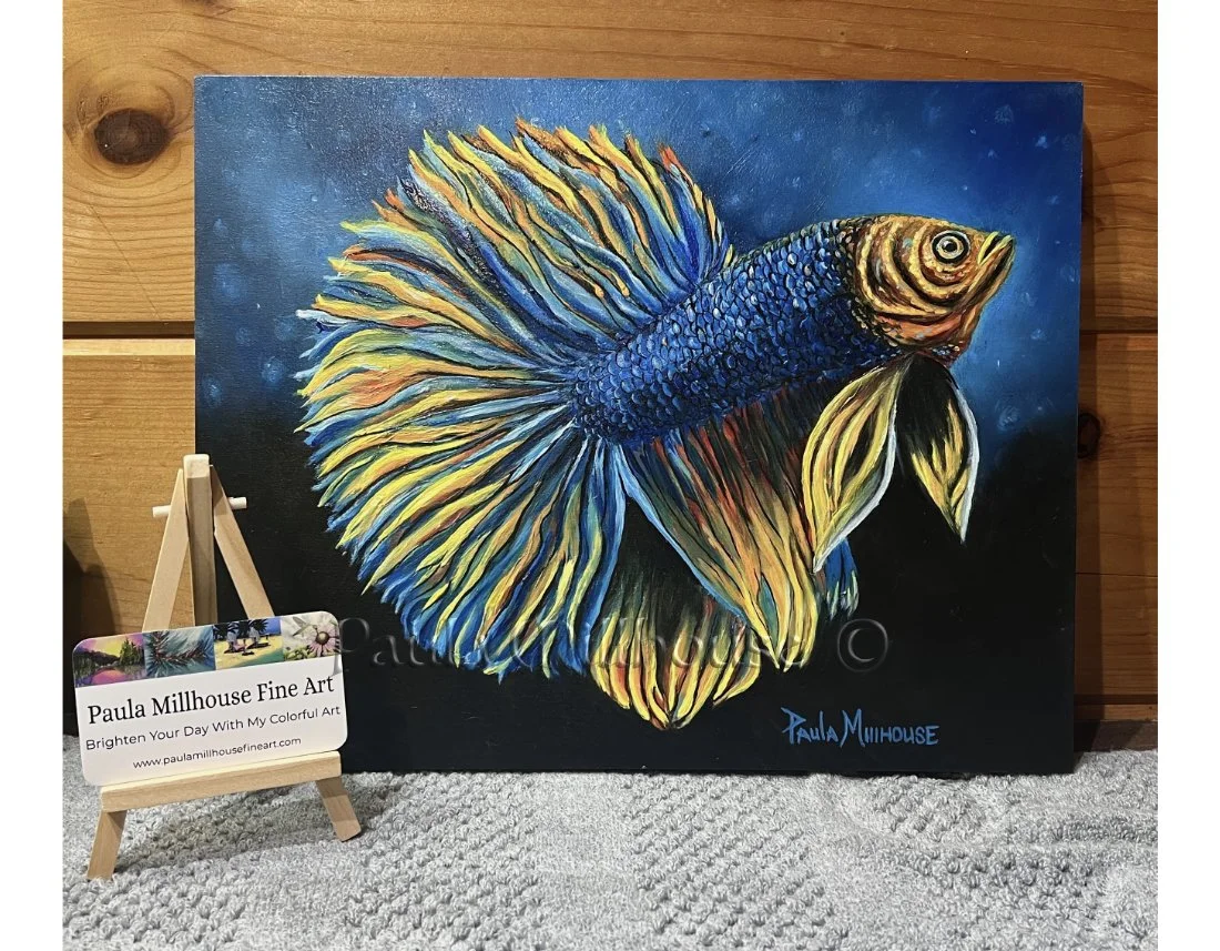 Original oil painting of a brilliant blue and gold Betta fish swimming through deep blue water, painted on 11x14 cradled wood panel by wildlife artist Paula Millhouse.