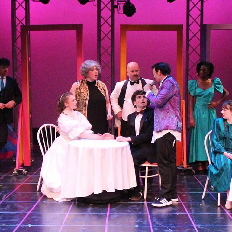 Teddy in the ensemble of The Wedding Singer at the Cortland Repertory Theatre