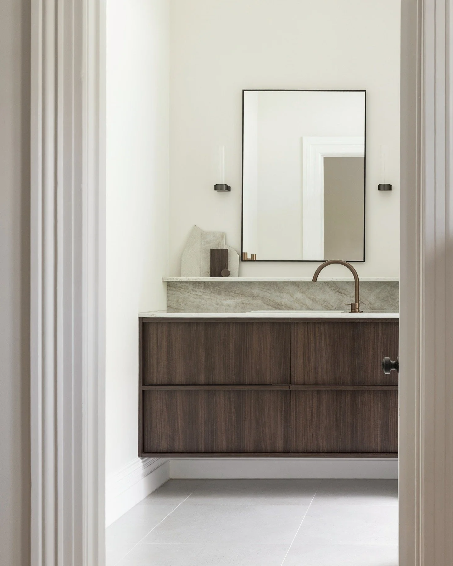 A calm blend of warm timber, soft stone, and clean lines &mdash; a refreshed ensuite designed for everyday simplicity.

#interiordesign #interiordesigner #nzinteriors #nz #ensuite #renovation #studio #clam #auckland #naturaltones