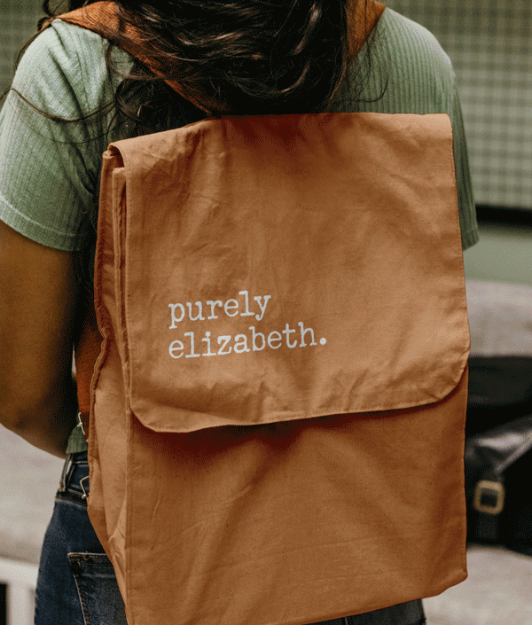 Rotating imagery from Purely Elizabeth original (and still existing) brand design: backpack with logo, packaging, business card, color palette.