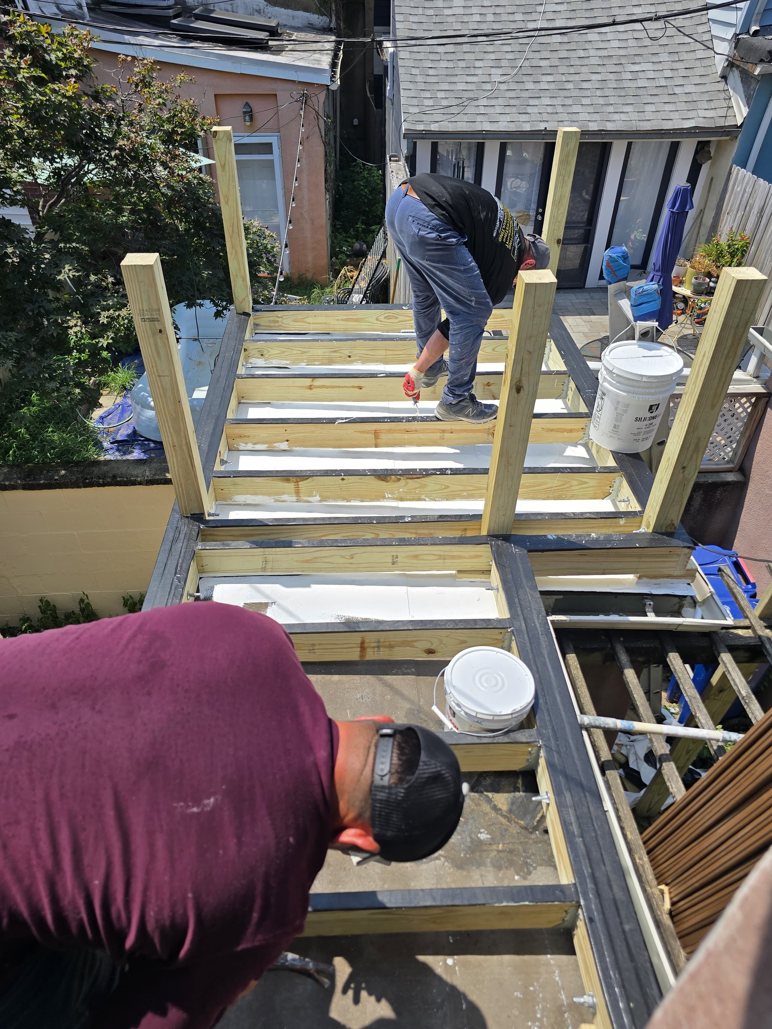 Custom wood deck construction project in Middletown. High-quality pressure-treated lumber and professional framing. Custom Deck, Roof Deck, Vinyl Hand rails, composite boards, door deck, deck builder, deck engineering, deck builder in NYC, deck build