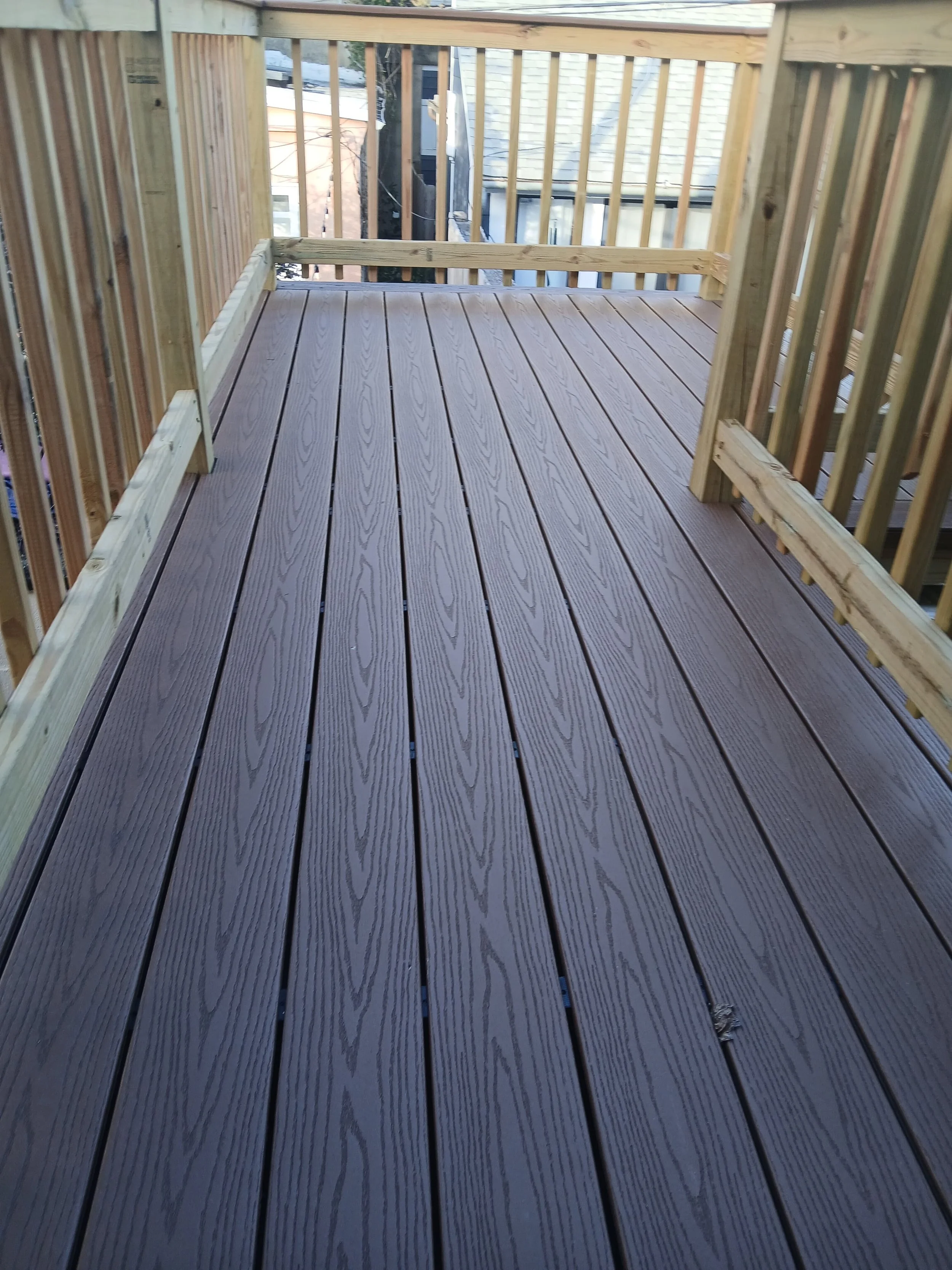 Custom wood deck construction project in Middletown. High-quality pressure-treated lumber and professional framing. Custom Deck, Roof Deck, Vinyl Hand rails, composite boards, door deck, deck builder, deck engineering, deck builder in NYC, deck build