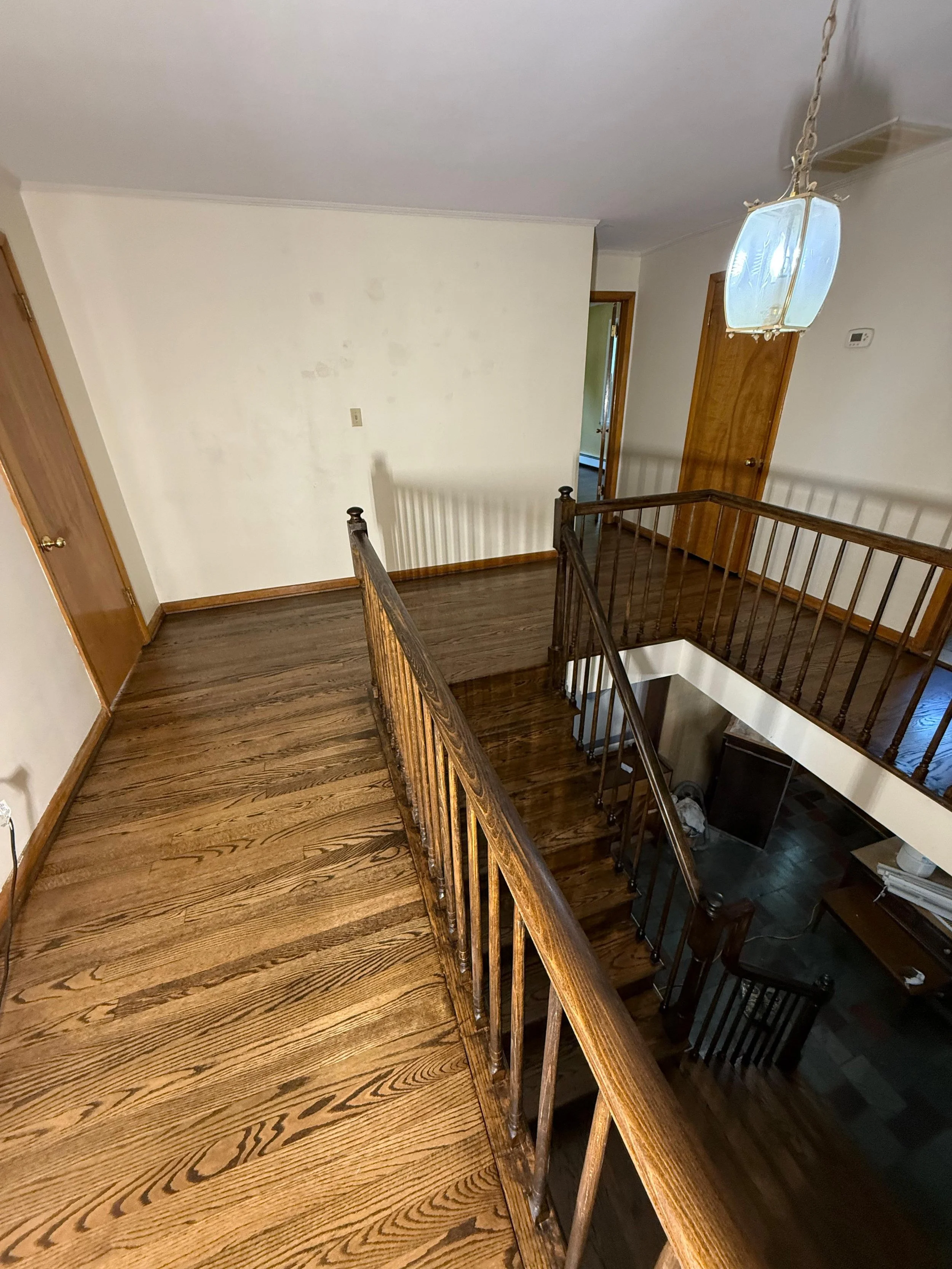 Hardwood refinishing, hardwood resurfacing, floor refinishing, floor sanding, floor staining , staining hardwood, Hardwood installation, ebony hardwood floor. Hardwood floor installation in Towson, MD, with affordable home improvement financing.