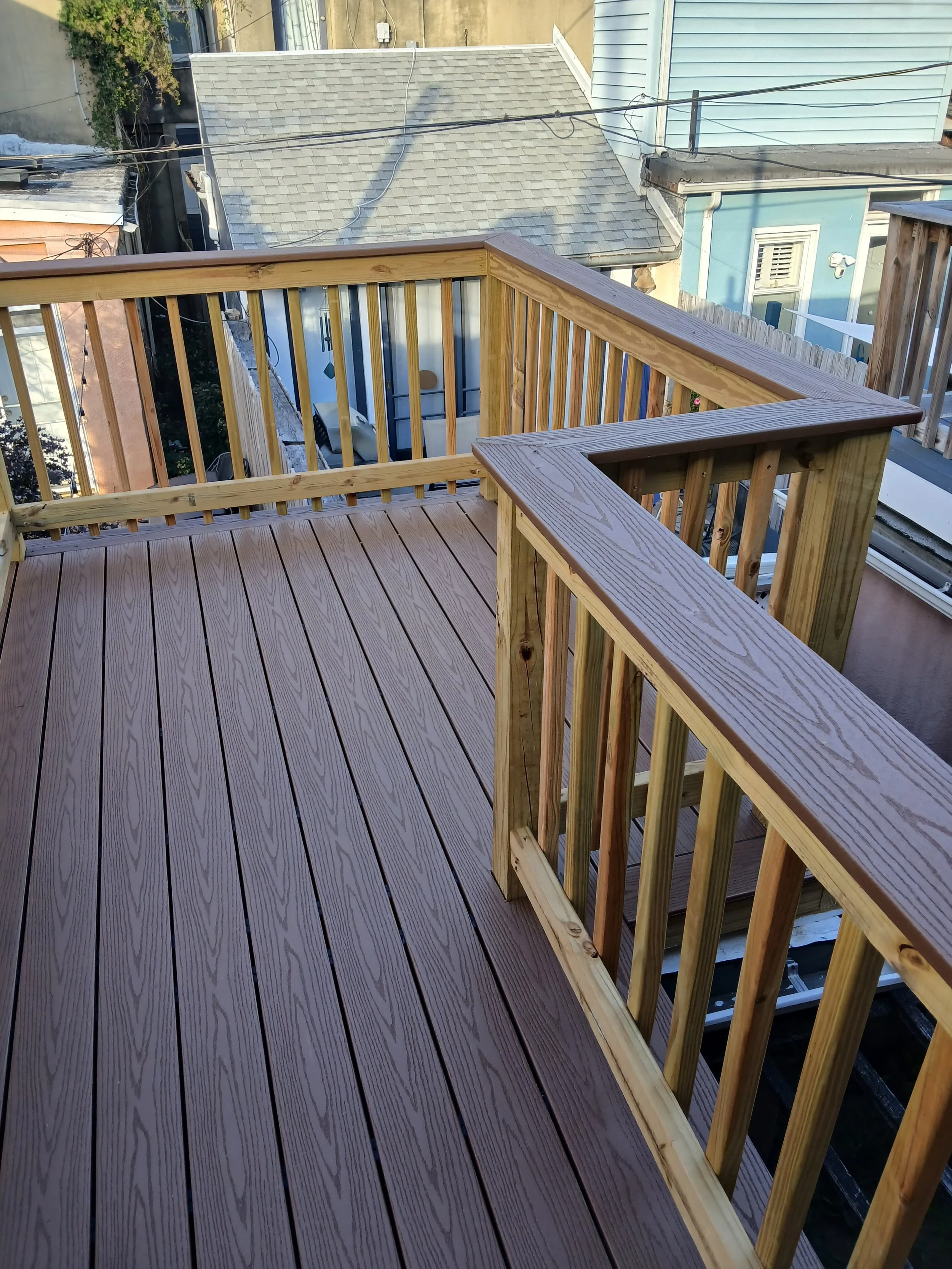 Custom wood deck construction project in Middletown. High-quality pressure-treated lumber and professional framing. Custom Deck, Roof Deck, Vinyl Hand rails, composite boards, door deck, deck builder, deck engineering, deck builder in NYC, deck build