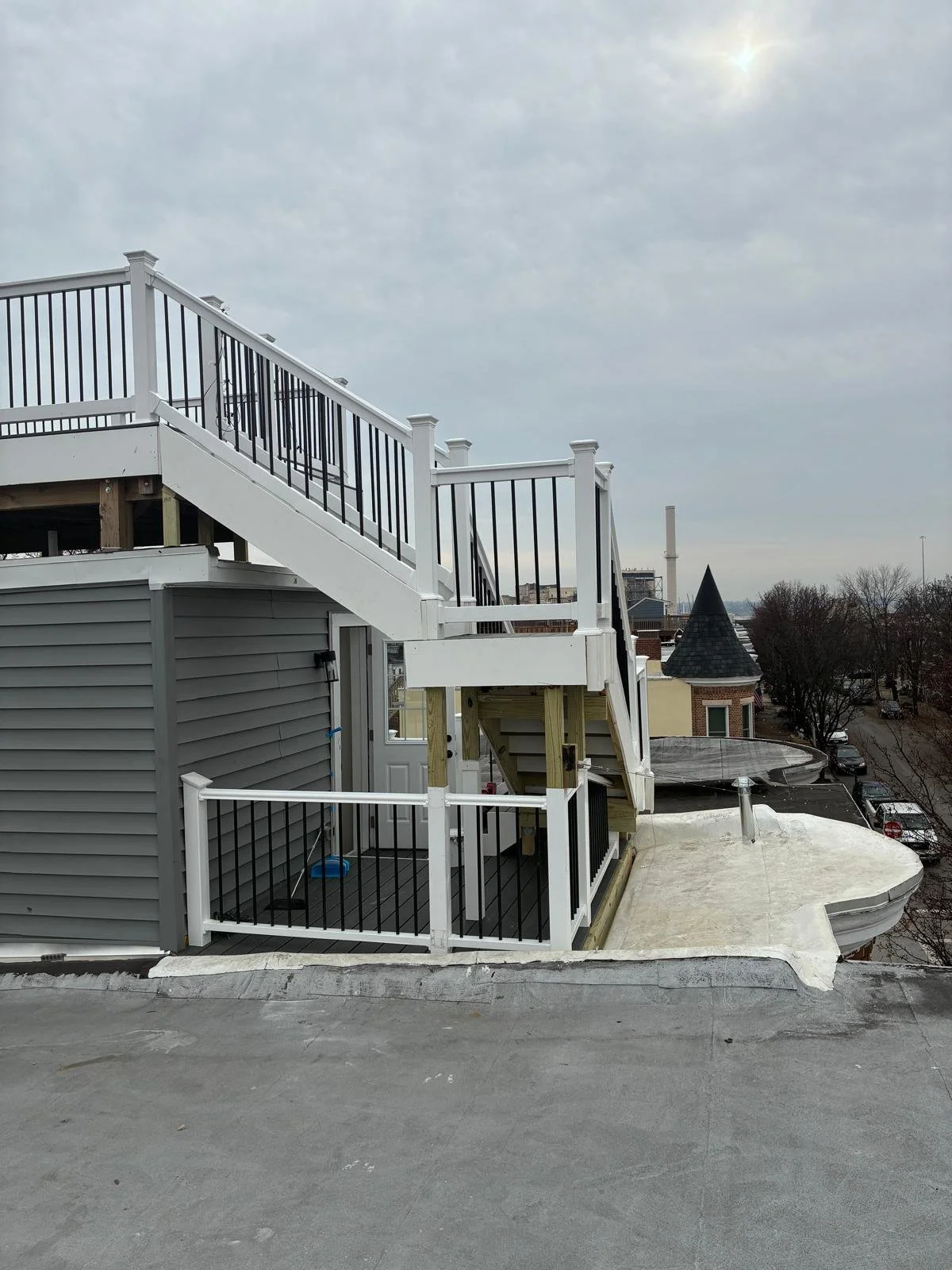 Custom Deck, Roof Deck, Vinyl Hand rails, composite boards, door deck, deck builder, deck engineering, deck builder in NYC, deck builder in Baltimore, Deck builder in New Jersey.