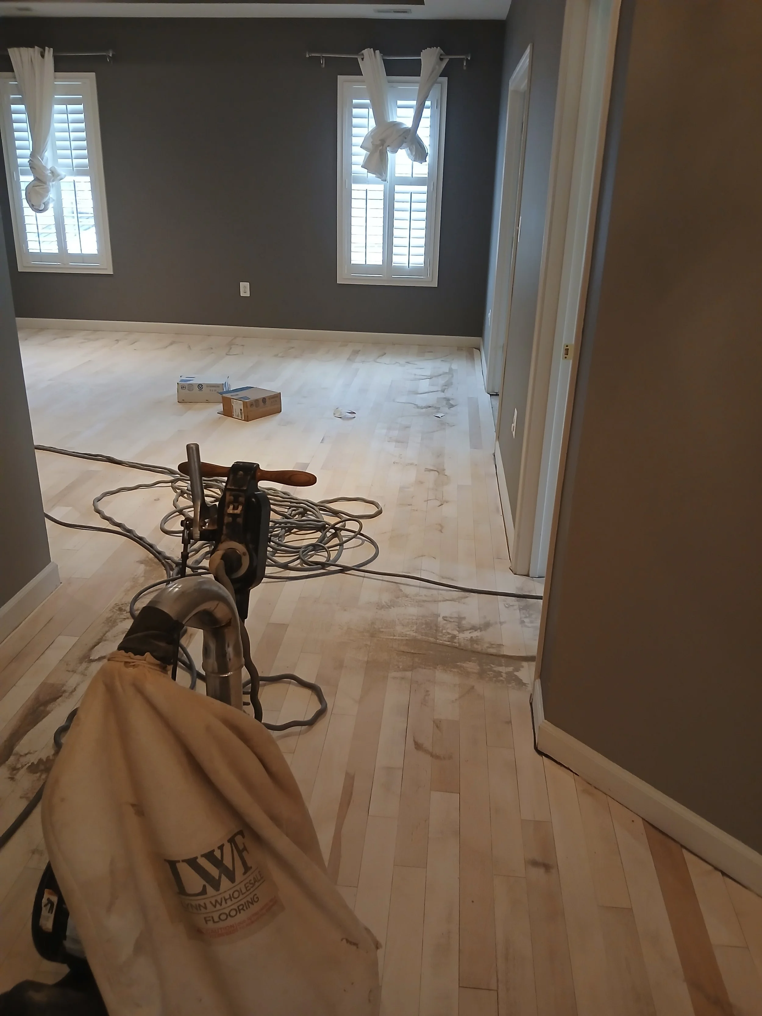 Hardwood refinishing, hardwood resurfacing, floor refinishing, floor sanding, floor staining , staining hardwood, Hardwood installation, ebony hardwood floor