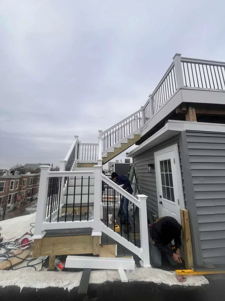 Custom Deck, Roof Deck, Vinyl Hand rails, composite boards, door deck, deck builder, deck engineering, deck builder in NYC, deck builder in Baltimore, Deck builder in New Jersey.