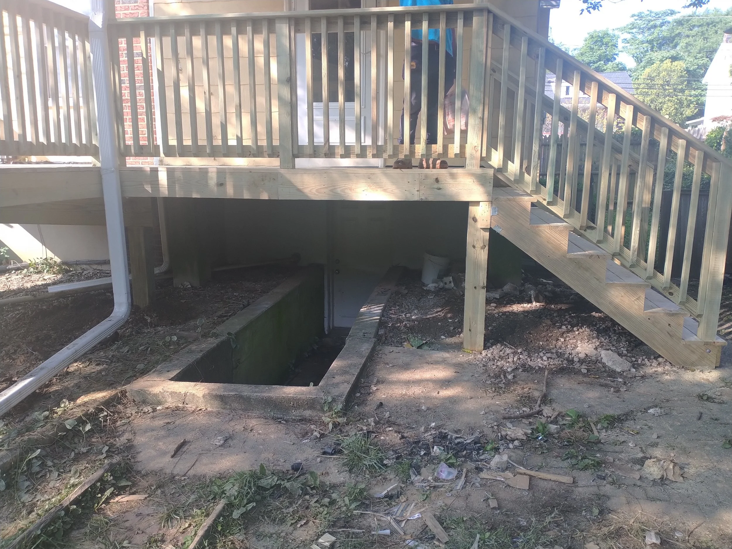 Structural elevated deck framing with pressure-treated lumber. Expert outdoor construction in Point Pleasant Beach, NJ. Custom wood deck construction project in Middletown. High-quality pressure-treated lumber and professional framing. Custom Deck, R