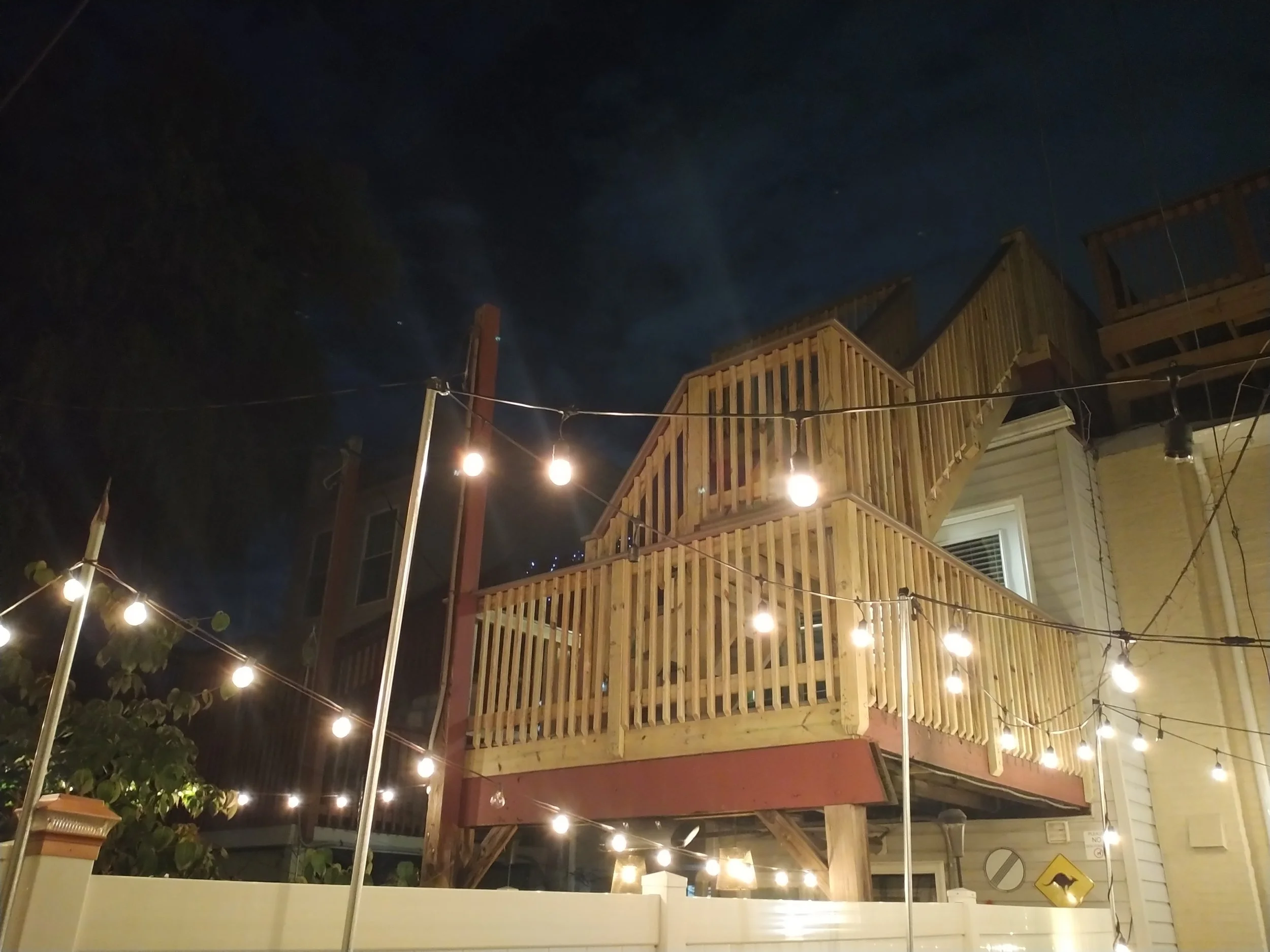 Professional deck staircase stringer installation. Custom-built outdoor access solutions in Bushwick, NY.