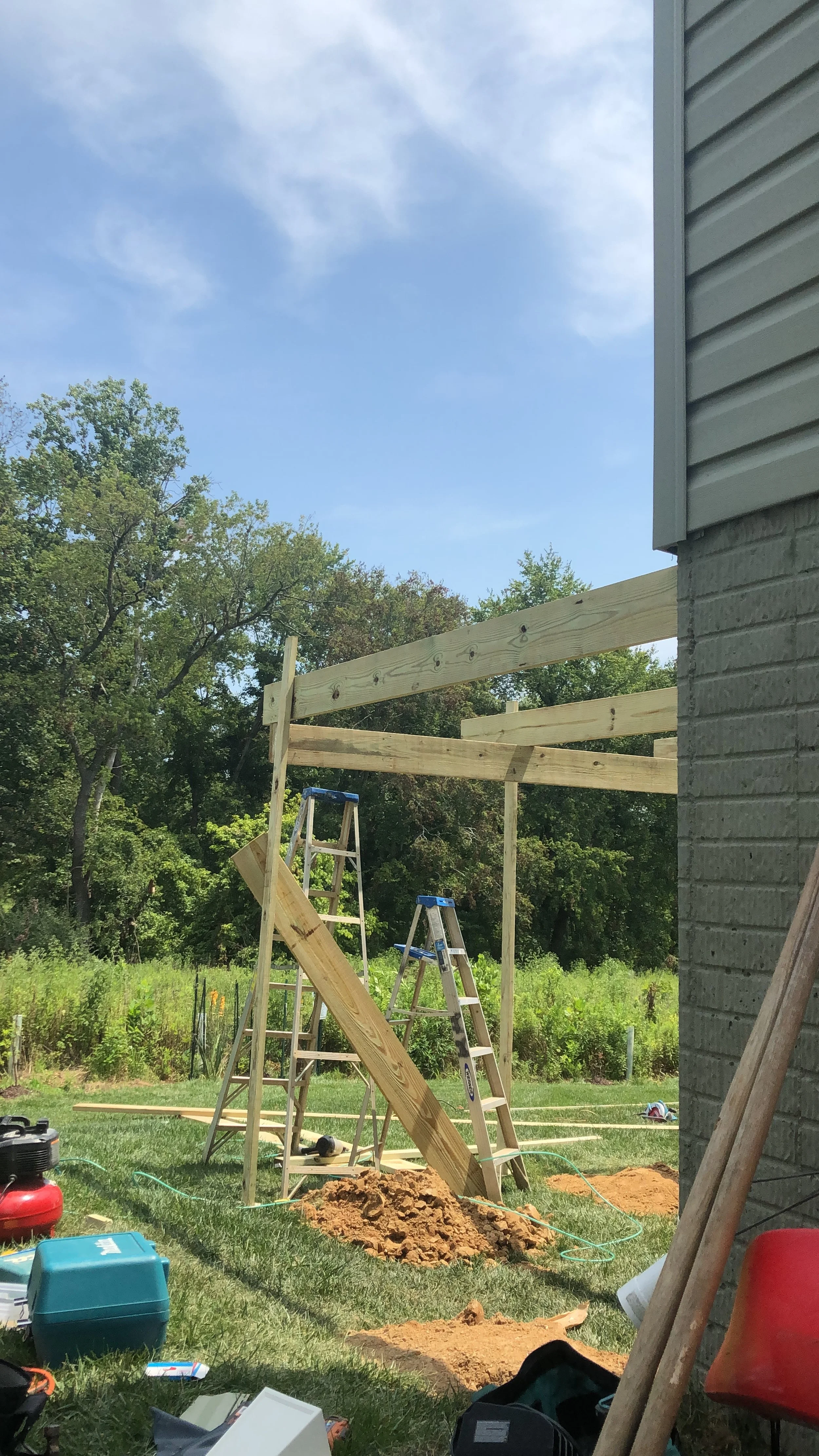 Structural elevated deck framing with pressure-treated lumber. Expert outdoor construction in Point Pleasant Beach, NJ. Custom wood deck construction project in Middletown. High-quality pressure-treated lumber and professional framing. Custom Deck, R
