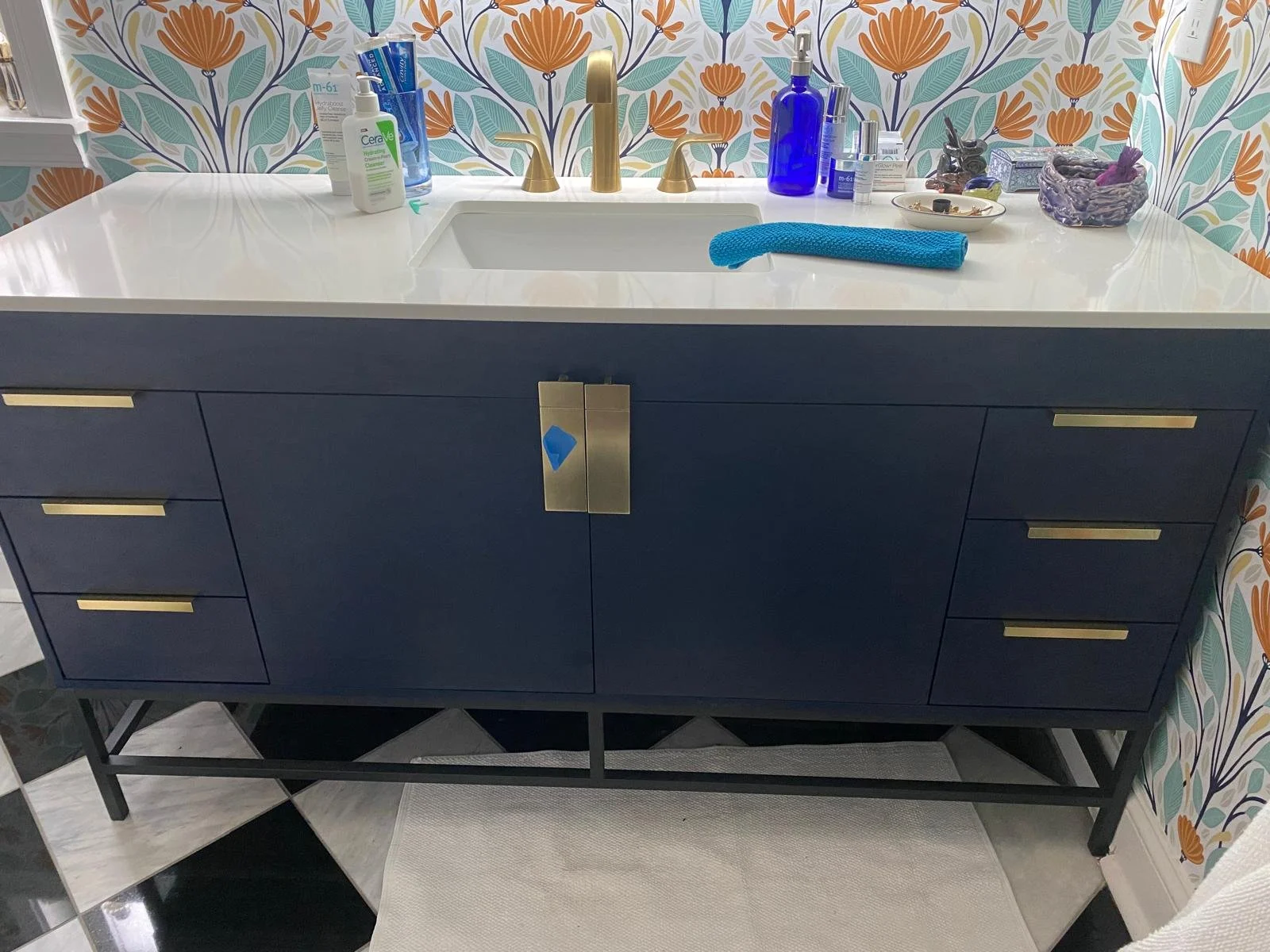 High-efficiency toilet installation and professional floor tiling. Complete bathroom transformation in Lakewood, New Jersey.