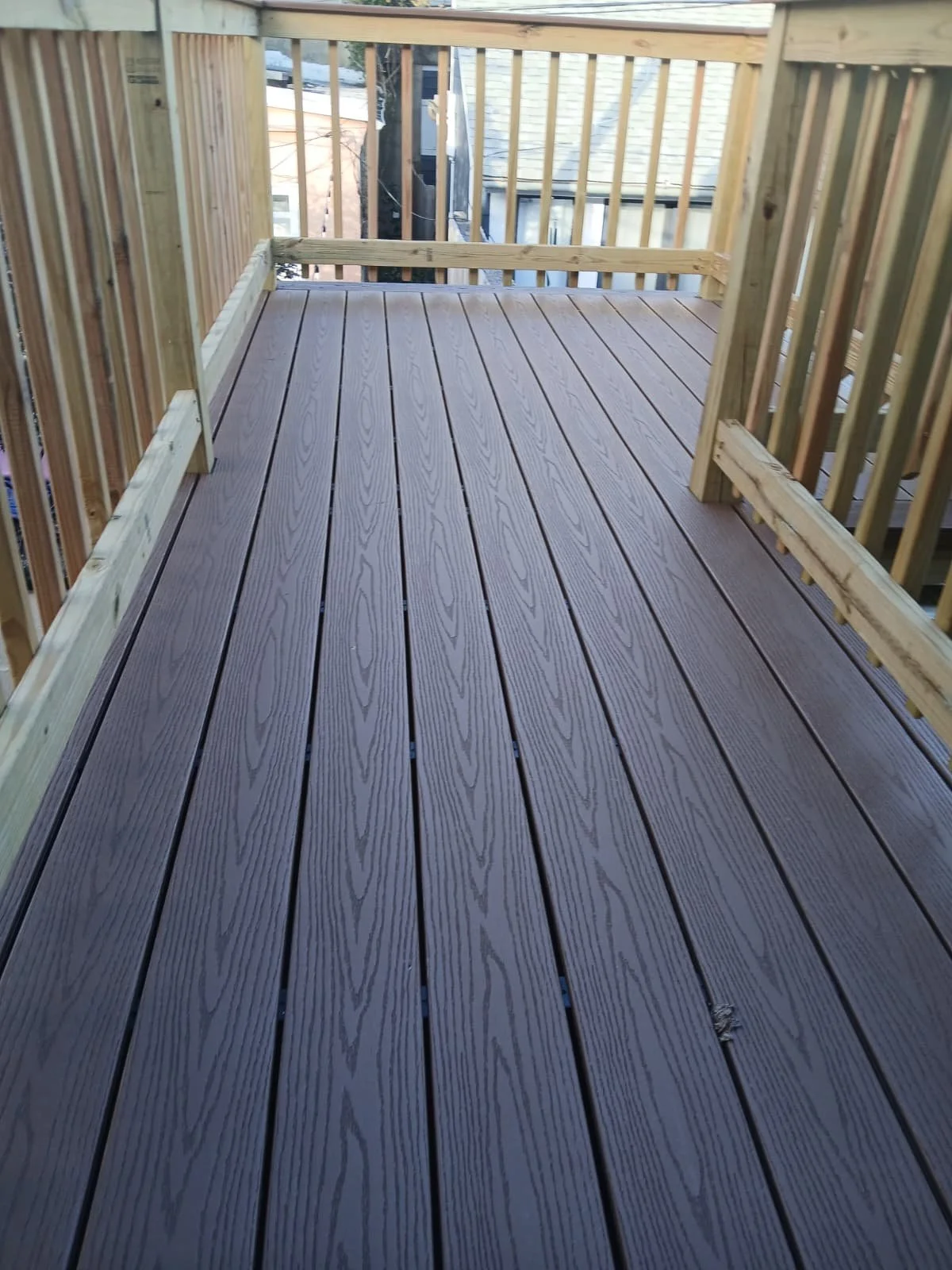 Custom wood deck construction project in Middletown. High-quality pressure-treated lumber and professional framing. Custom Deck, Roof Deck, Vinyl Hand rails, composite boards, door deck, deck builder, deck engineering, deck builder in NYC, deck build
