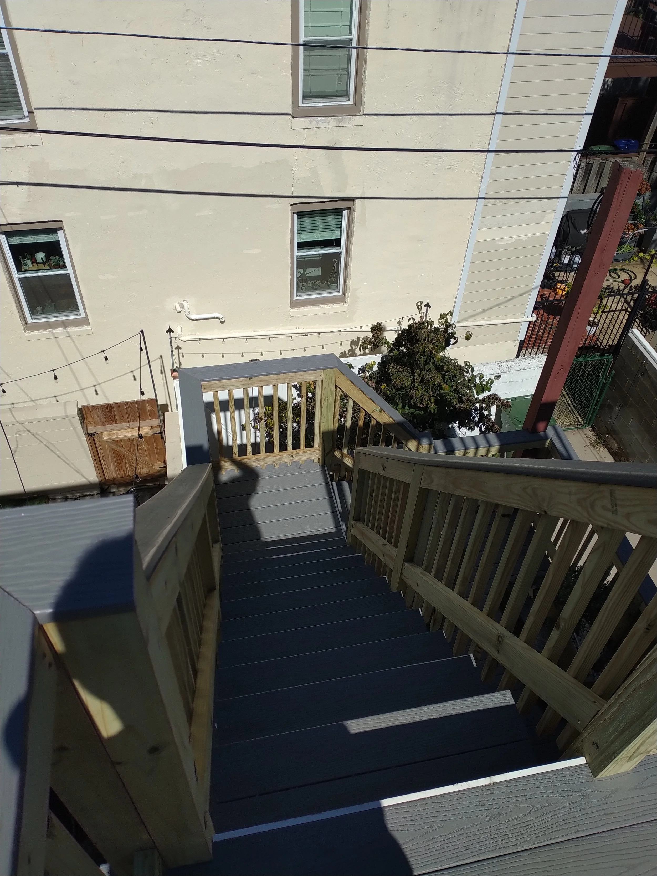 Secure deck railing post installation for safety and style. Professional finishing in Bushwick, New York City.