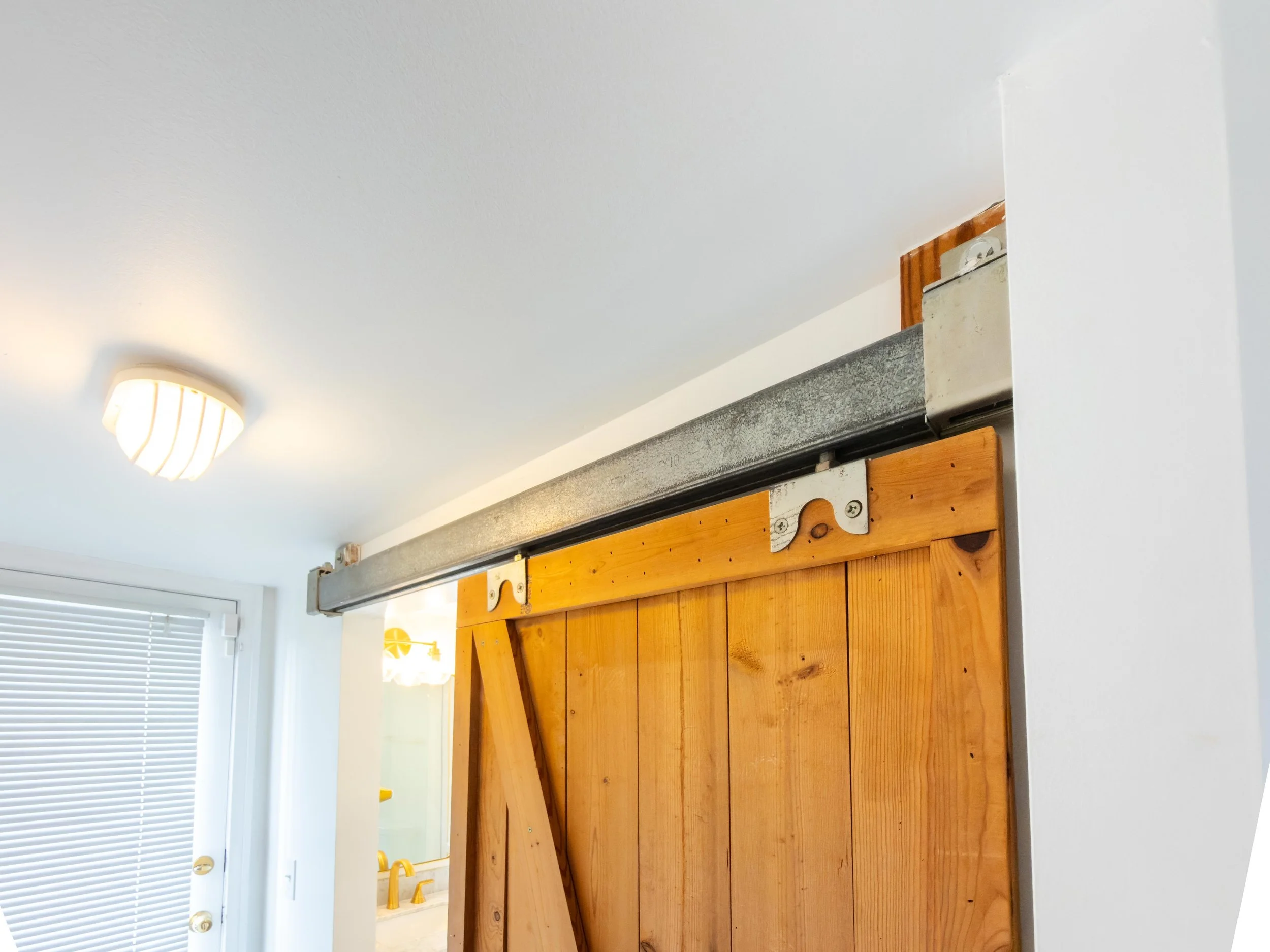 Barn Door, Custom glass door, shower niche, white subway tiles, luxury bathroom, New York  bathroom style, New Jersey bathroom remodeling, Maryland bathroom remodeling, luxury remodeling, Bathroom refresh.