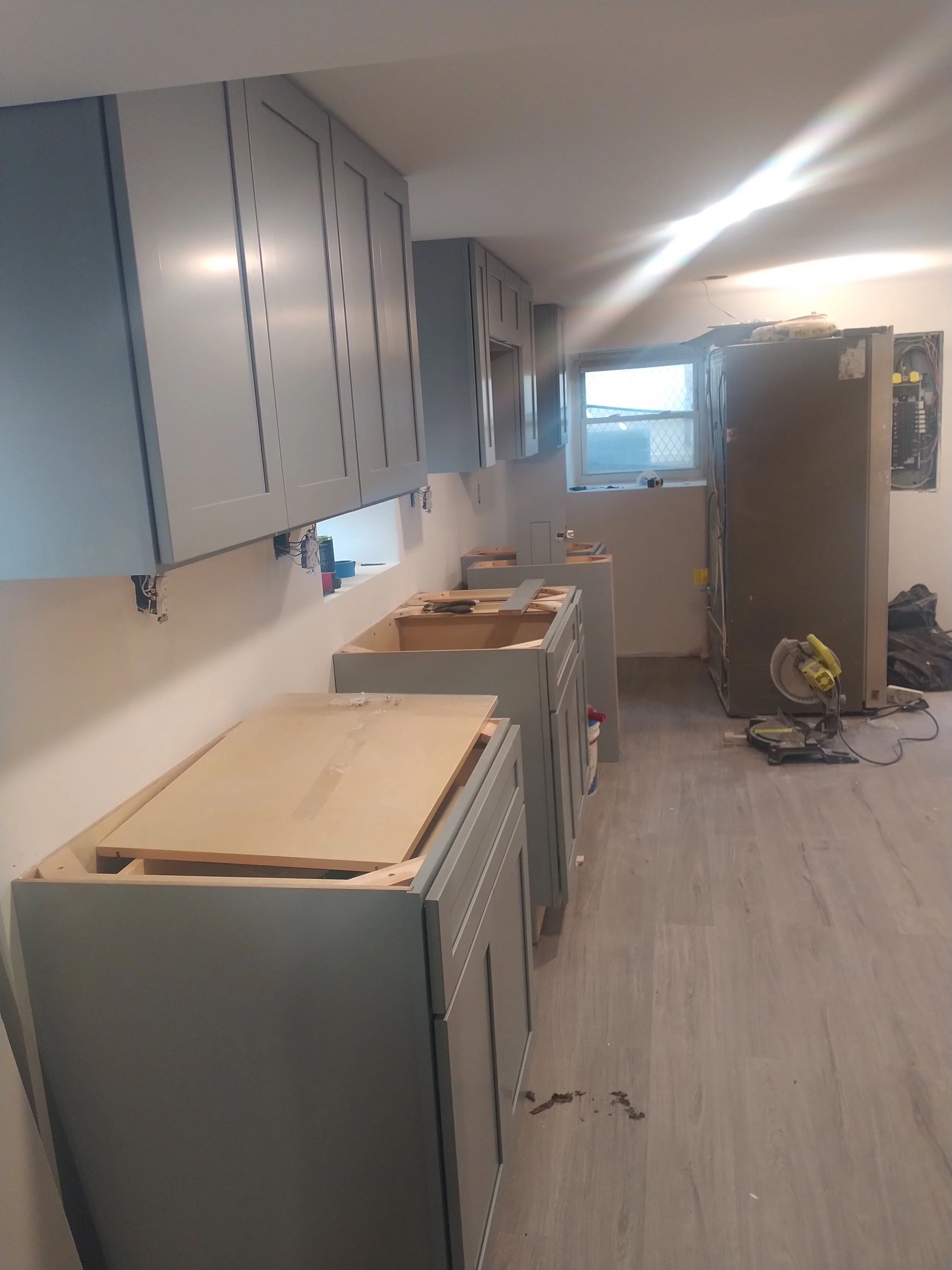 Custom oak cabinetry installation in Belair, Maryland. Precision woodworking and premium storage solutions for luxury kitchens by Elite Craft Construction.