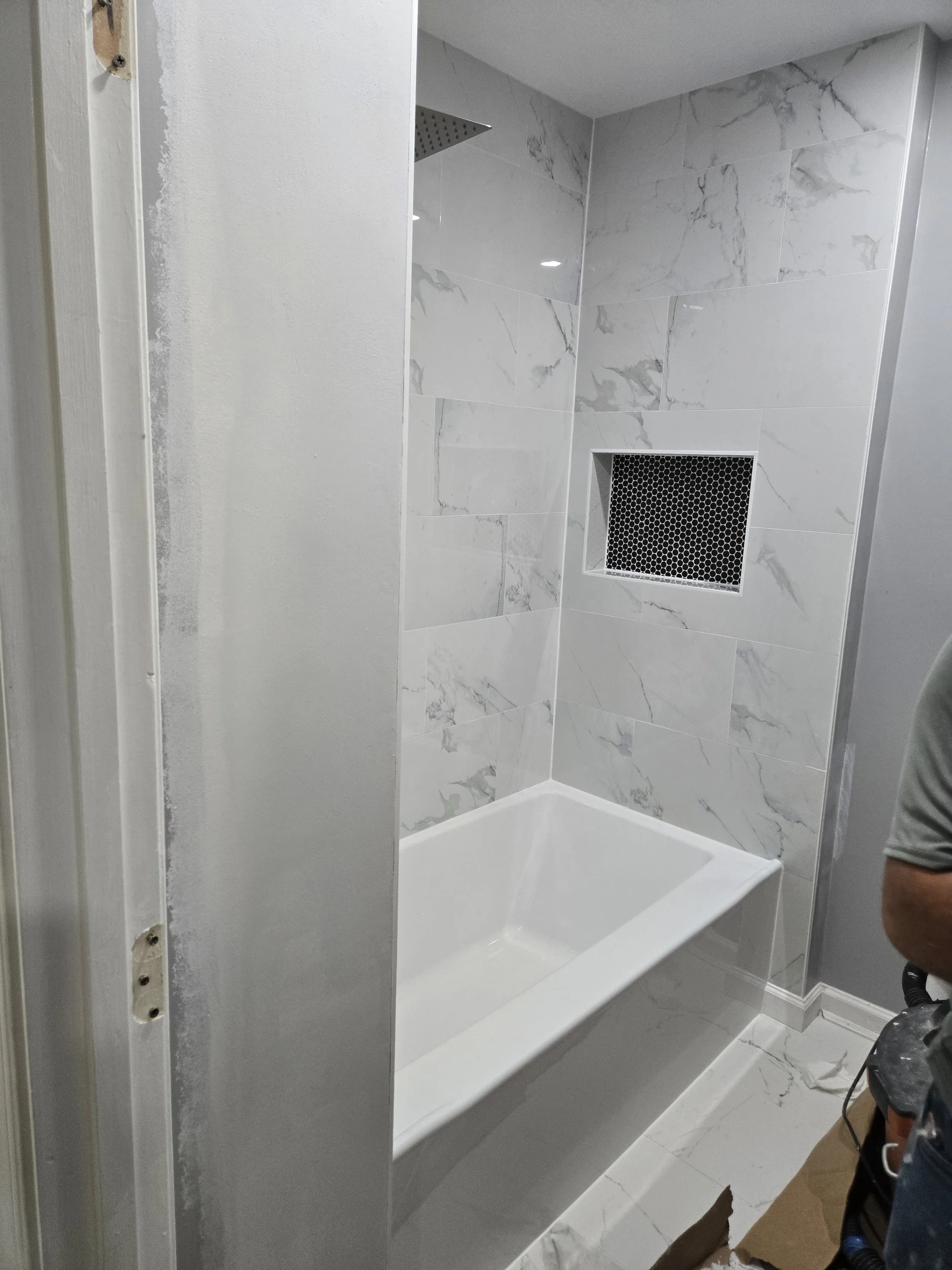 Minimalist bathroom sink with professional faucet fitting. Clean lines and superior finishes for homes in Red Bank, NJ.