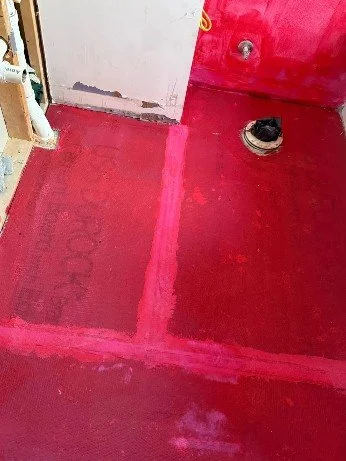 High-end walk-in shower with professional tile craftsmanship. Custom shower renovation services in Severna Park, Maryland.