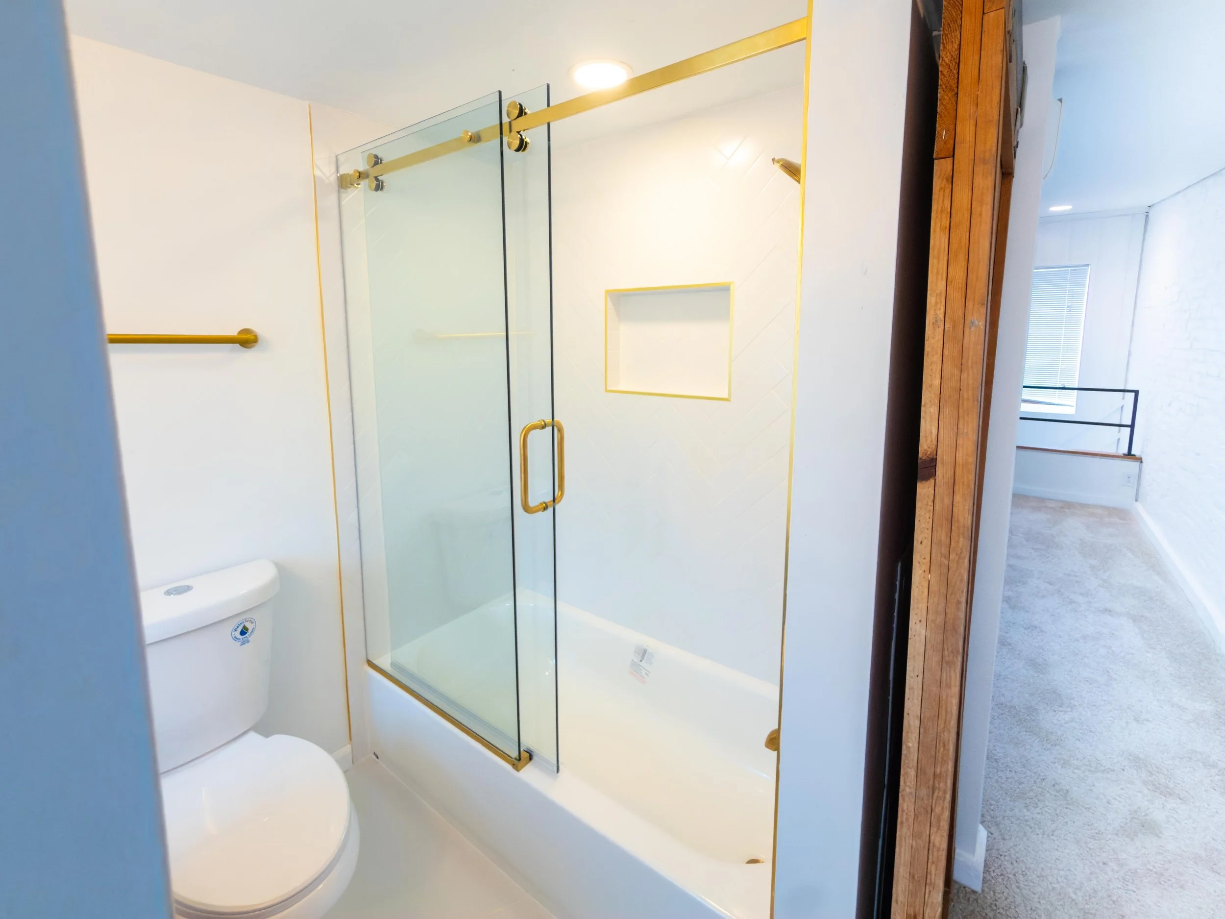 Barn Door, Custom glass door, shower niche, white subway tiles, luxury bathroom, New York  bathroom style, New Jersey bathroom remodeling, Maryland bathroom remodeling, luxury remodeling, Bathroom refresh.