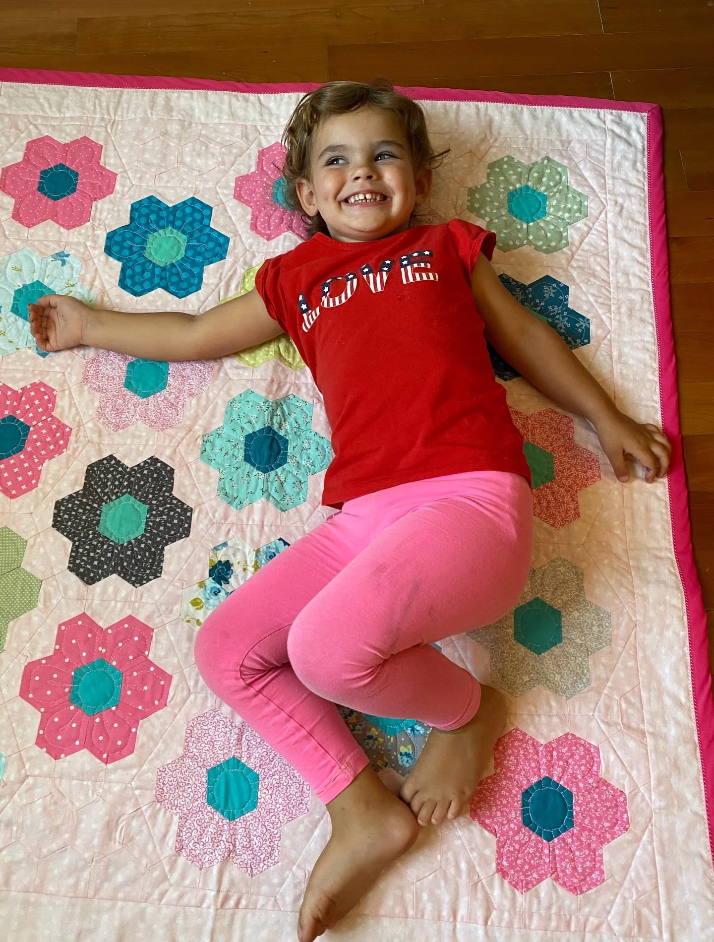 This photo takes me back. 💛 My daughter on the second quilt I ever made.

At the time, I had no idea what I had gotten myself into&hellip; this quilt was FULL of Y-seams 😅 Way more challenging than I was ready for as a beginner. There were definite
