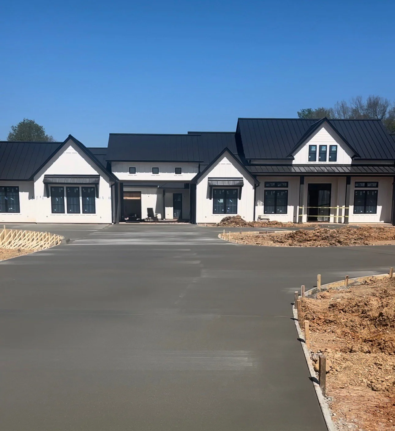 Newly constructed modern house paved beautiful driveway.