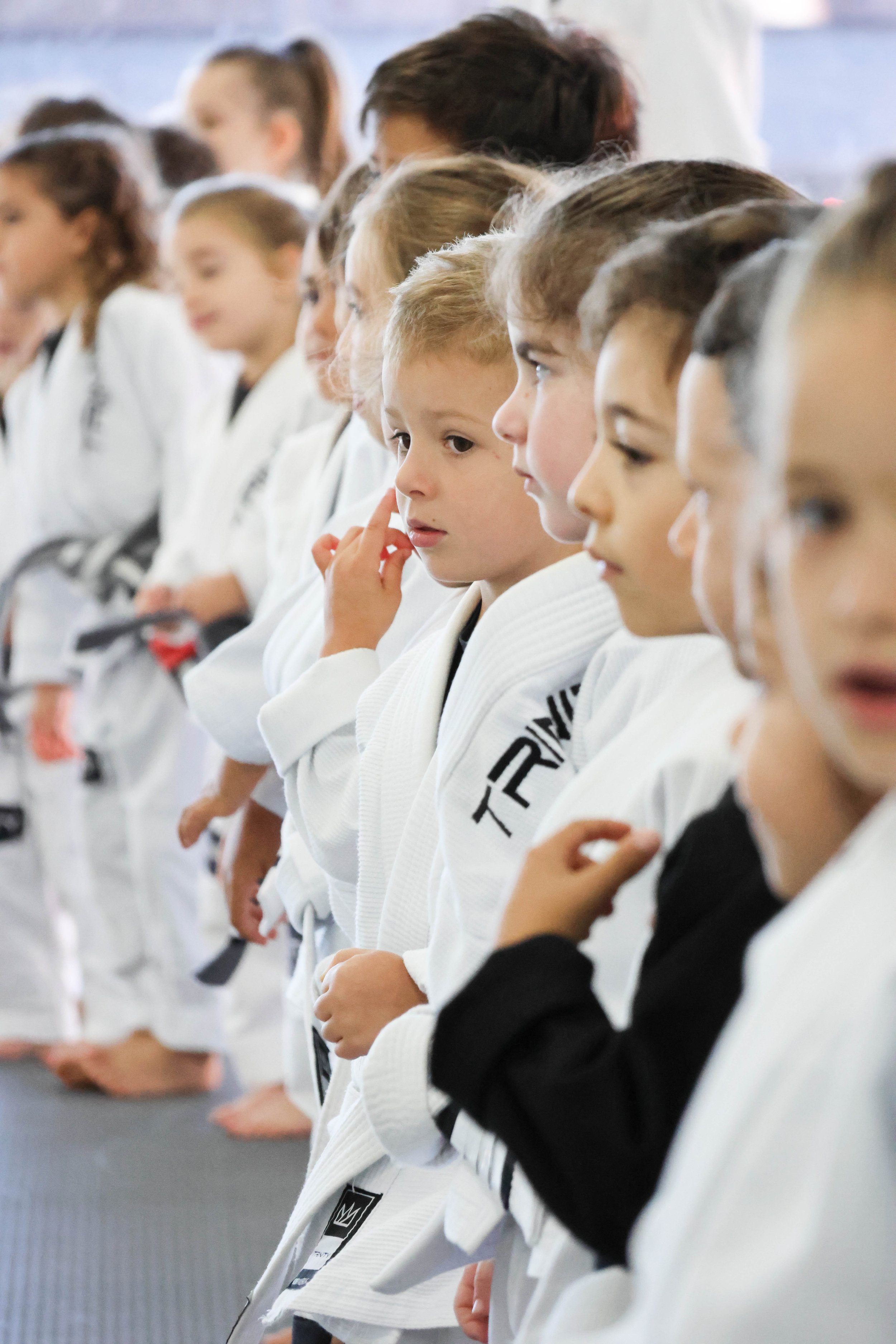Line of  kids Training Jiu Jitsu