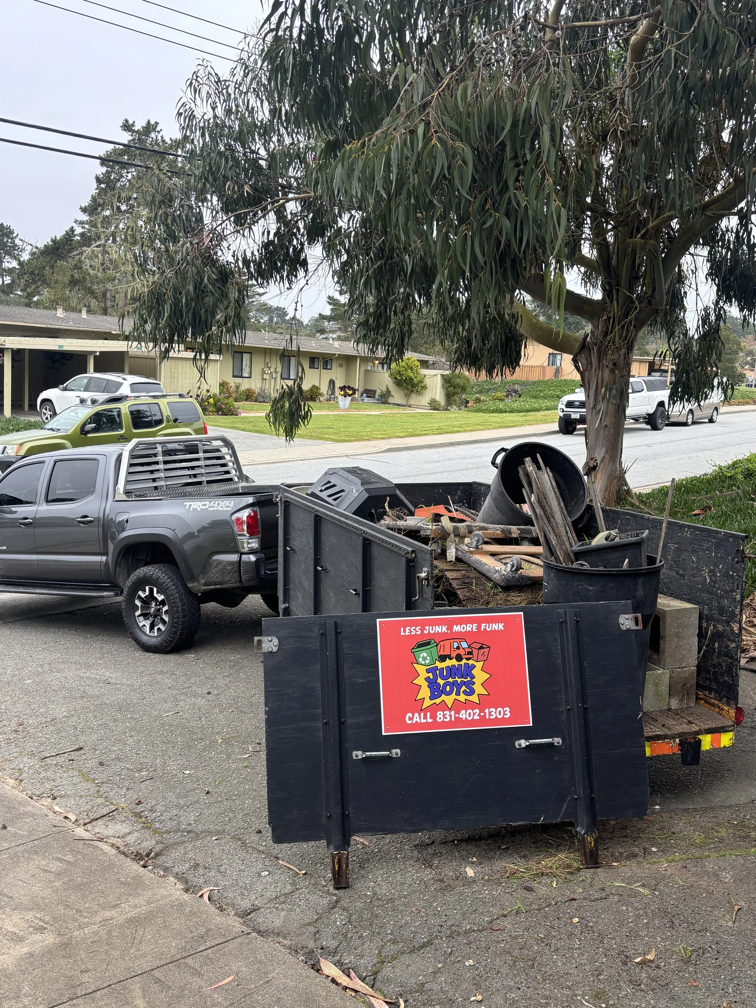 Full trailer load of junk removed from residential property in Seaside California