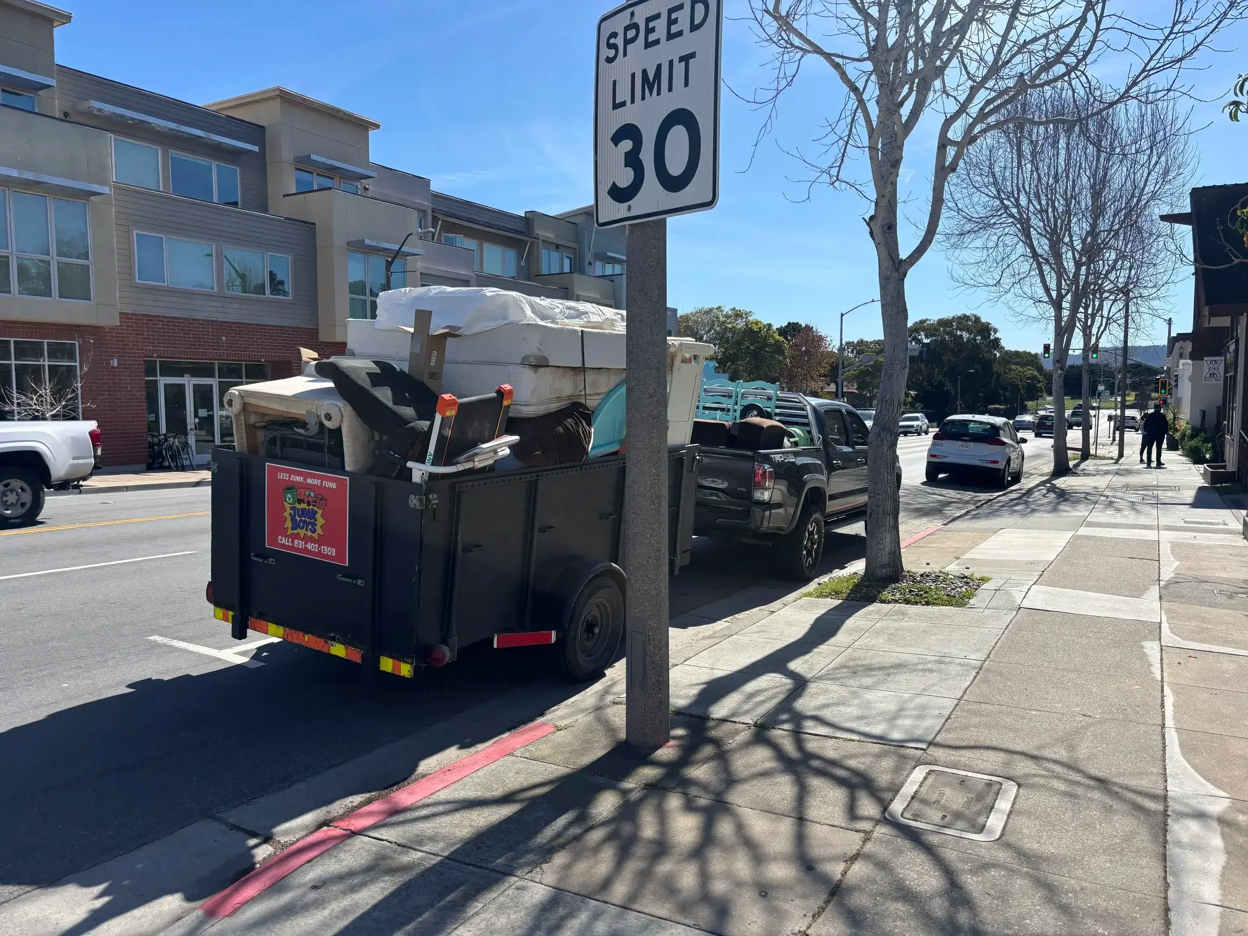 Full trailer from Monterey apartment cleanout by junk boys.