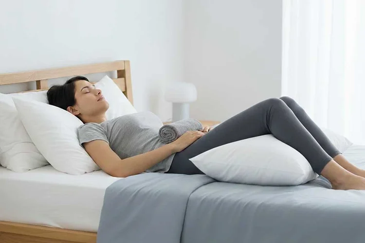 The Secret to Sleeping with Back Pain and How Pillow Placement Changes Everything