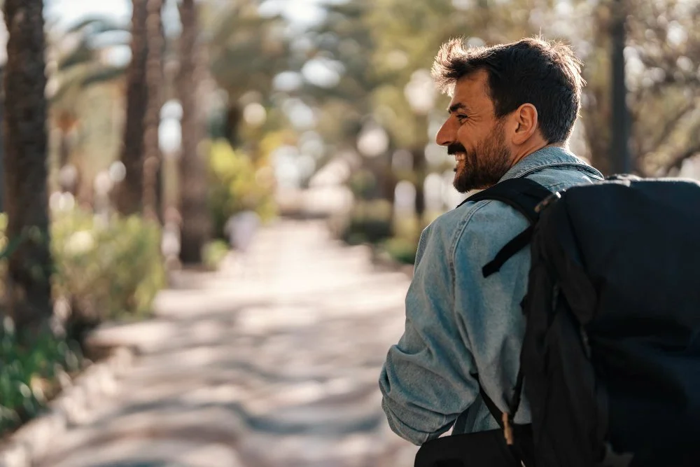 Happy patient returning to daily life after herniated disc treatment